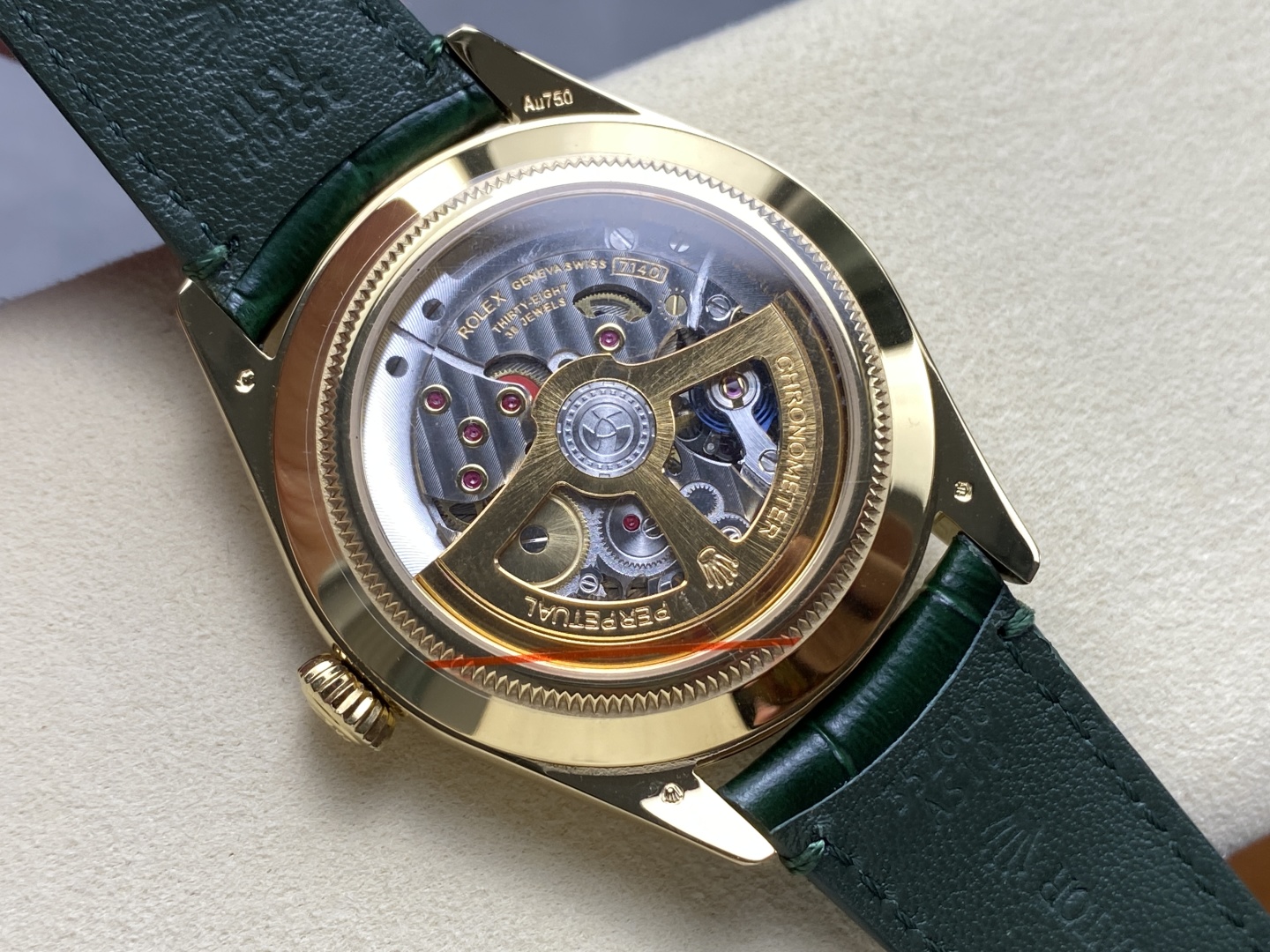 Transparent caseback of Rolex replica showing the intricate 7140 clone movement with gold oscillating rotor and 38 jewels