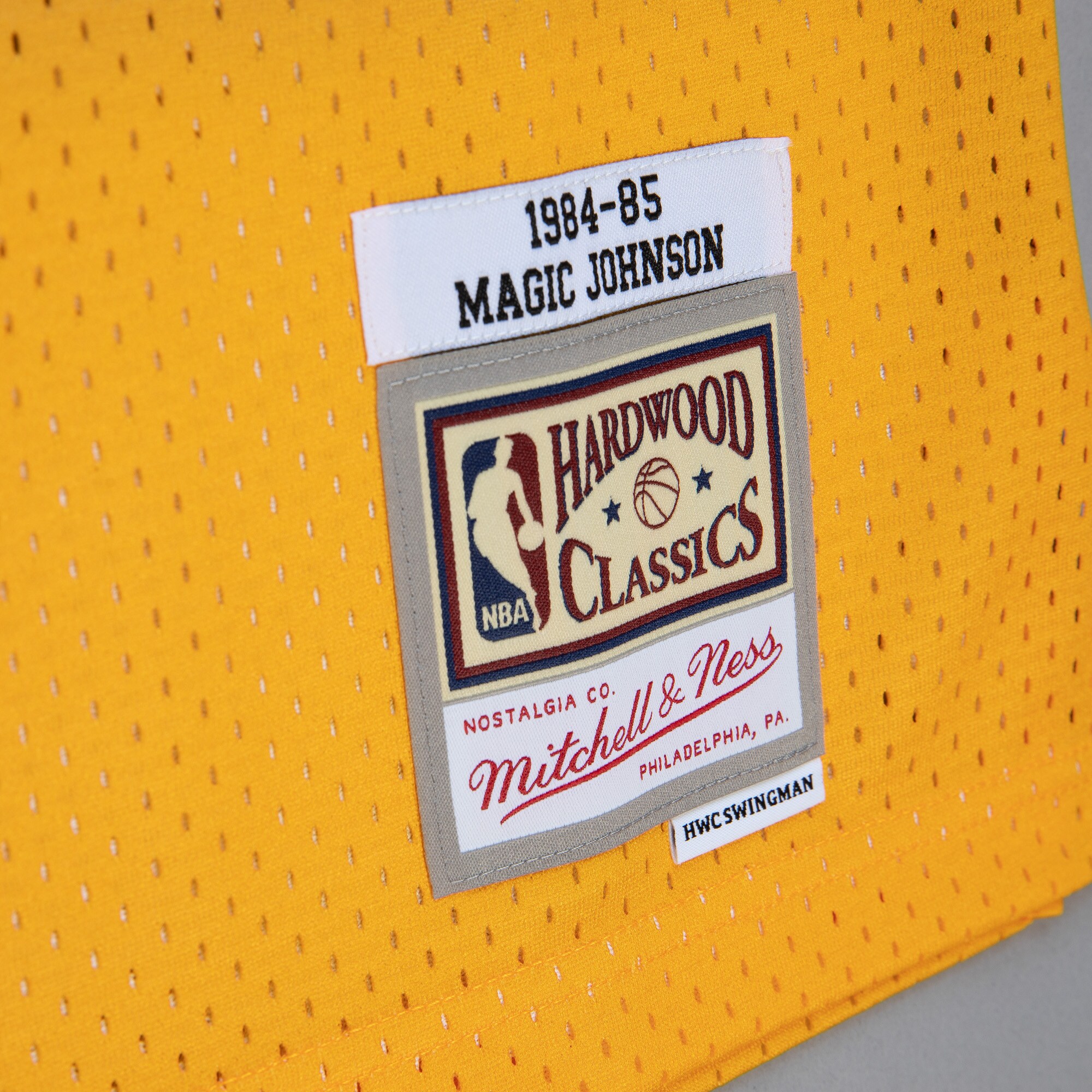 Magic Johnson Los Angeles Lakers Mitchell & Ness 1984\/85 Hardwood Classics Fadeaway Swingman Player Jersey - Gold\/Purple