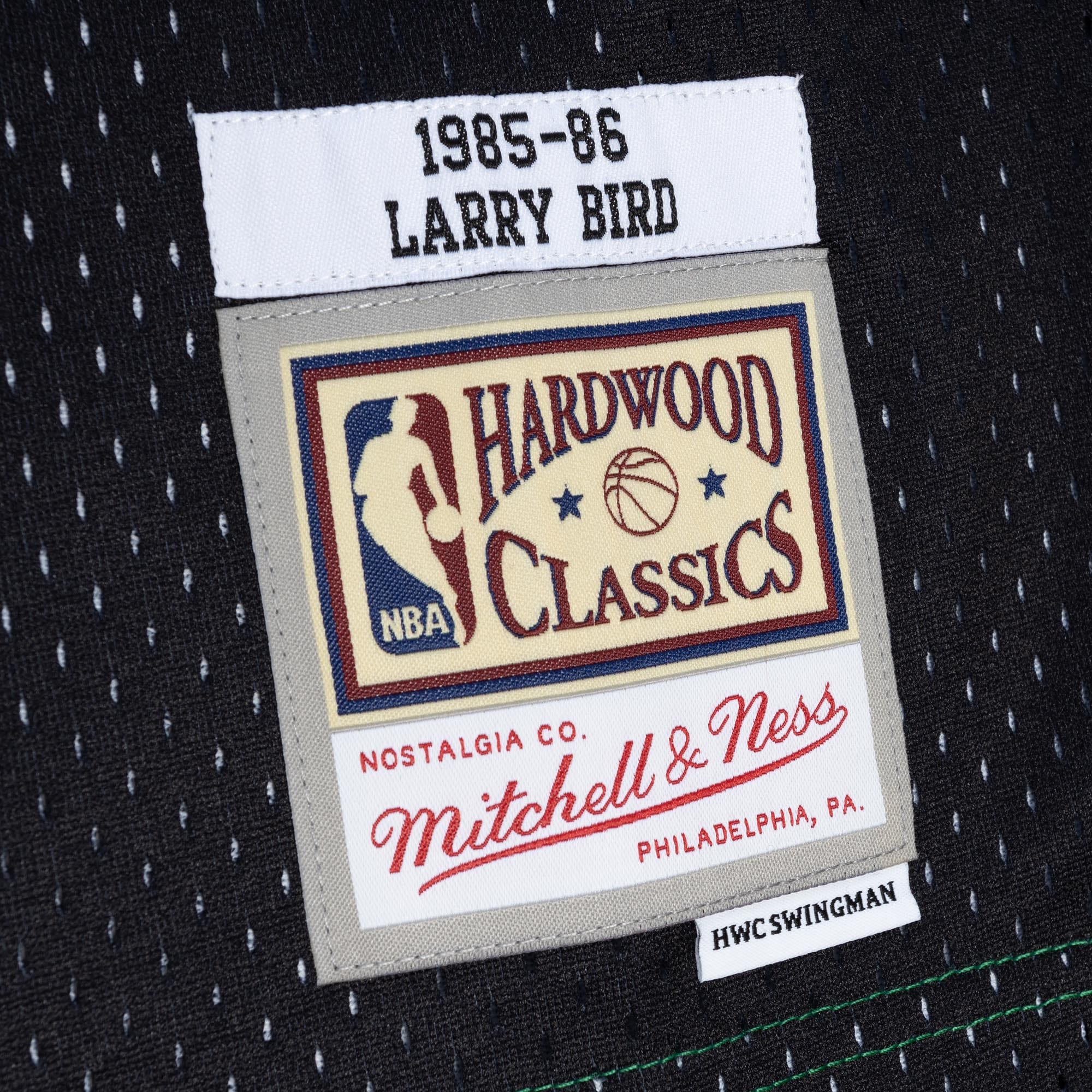 Larry Bird Boston Celtics Mitchell & Ness Hardwood Classics 1985\/86 Split Swingman Jersey - Black\/Kelly Green