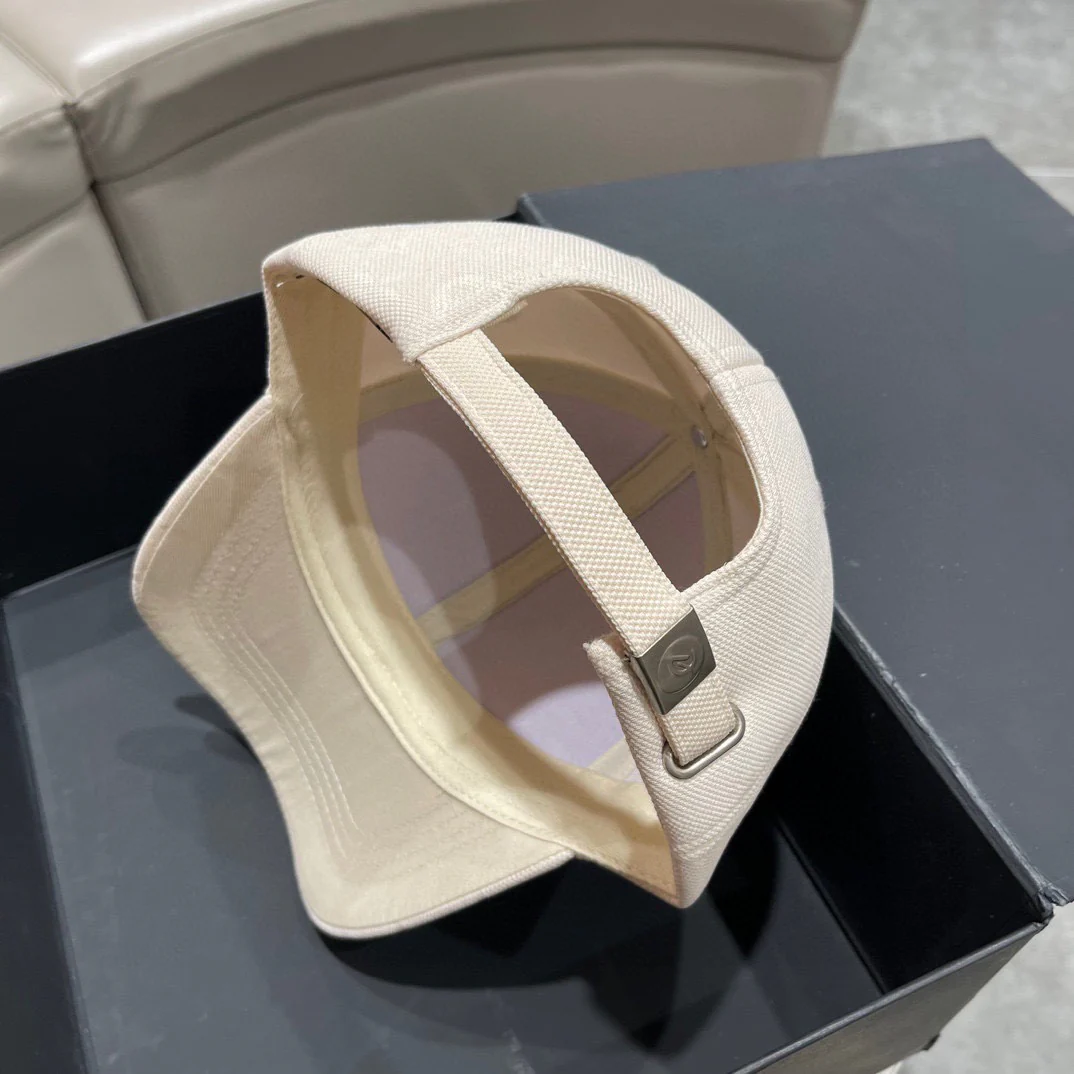 White, brown, black and grey Caps