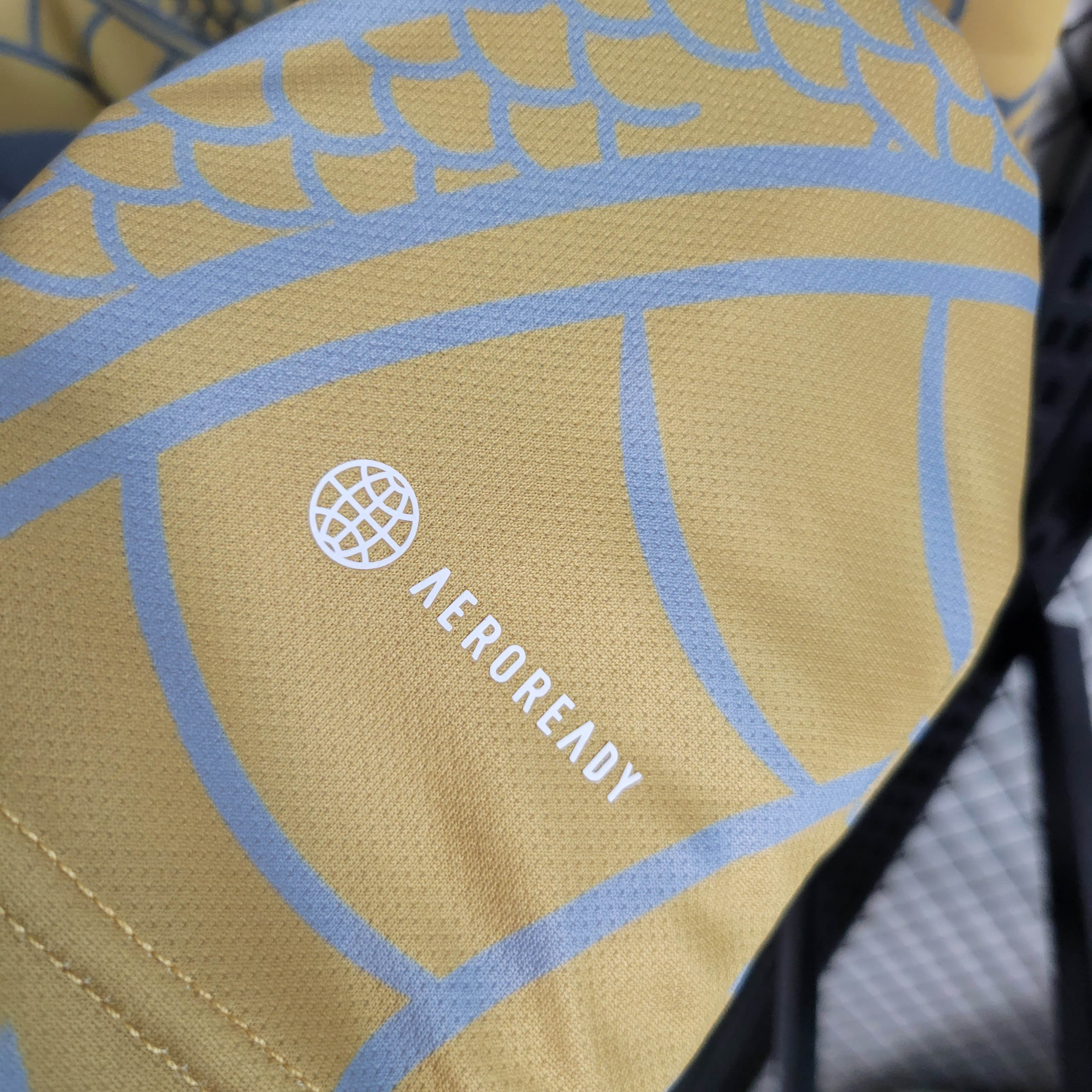 2023/2024 Real Madrid Chinese Dragon Gold Football Shirt