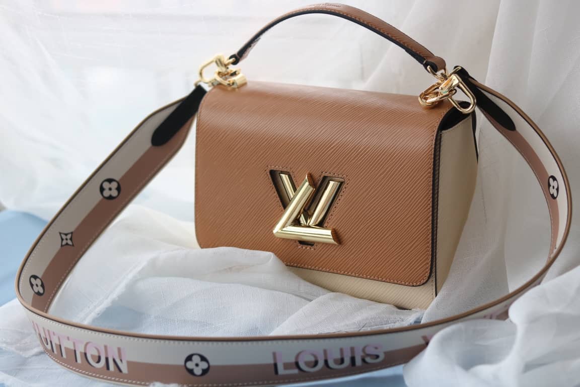 Louis Vuitton Textured Epi Leather Twist Series Bag Brown - DEEPREPS