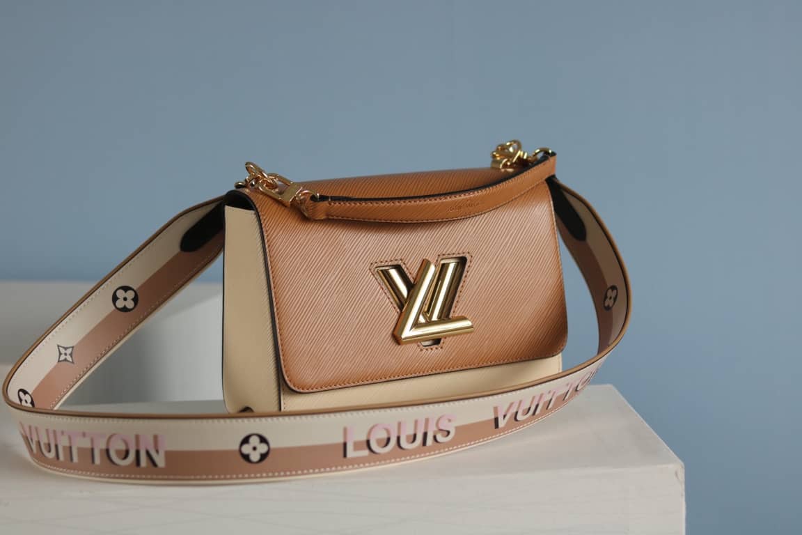 Louis Vuitton Textured Epi Leather Twist Series Bag Brown - DEEPREPS