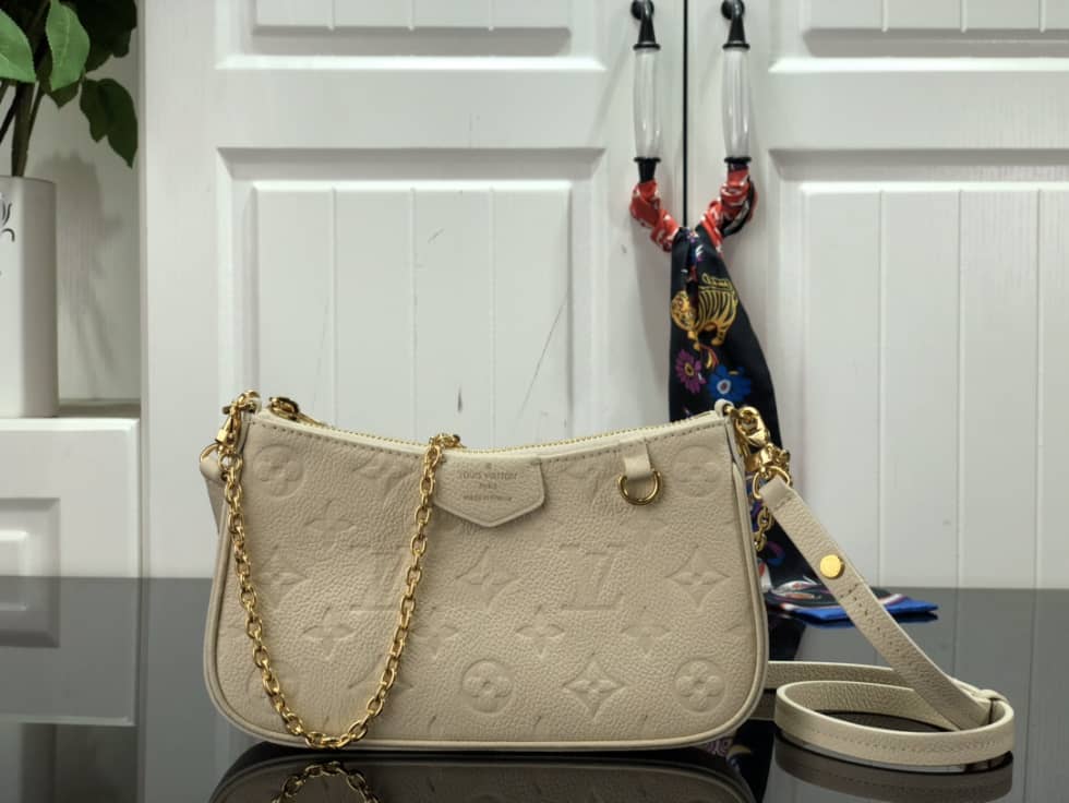 Louis Vuitton Easy Pouch On Strap Creme White Empreinte M81066 Replica - DEEPREPS