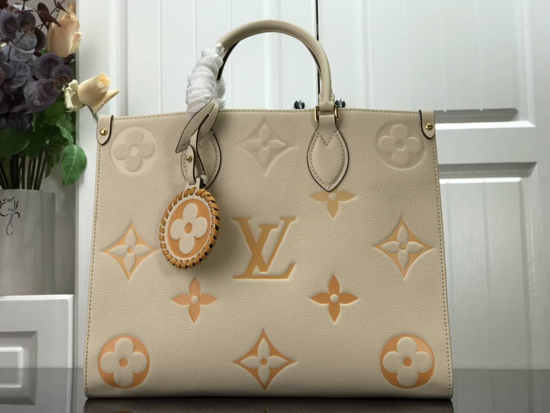 Louis Vuitton On the Go MM Monogram Empreinte Two-way Tote Replica Apricot M45717 - DEEPREPS