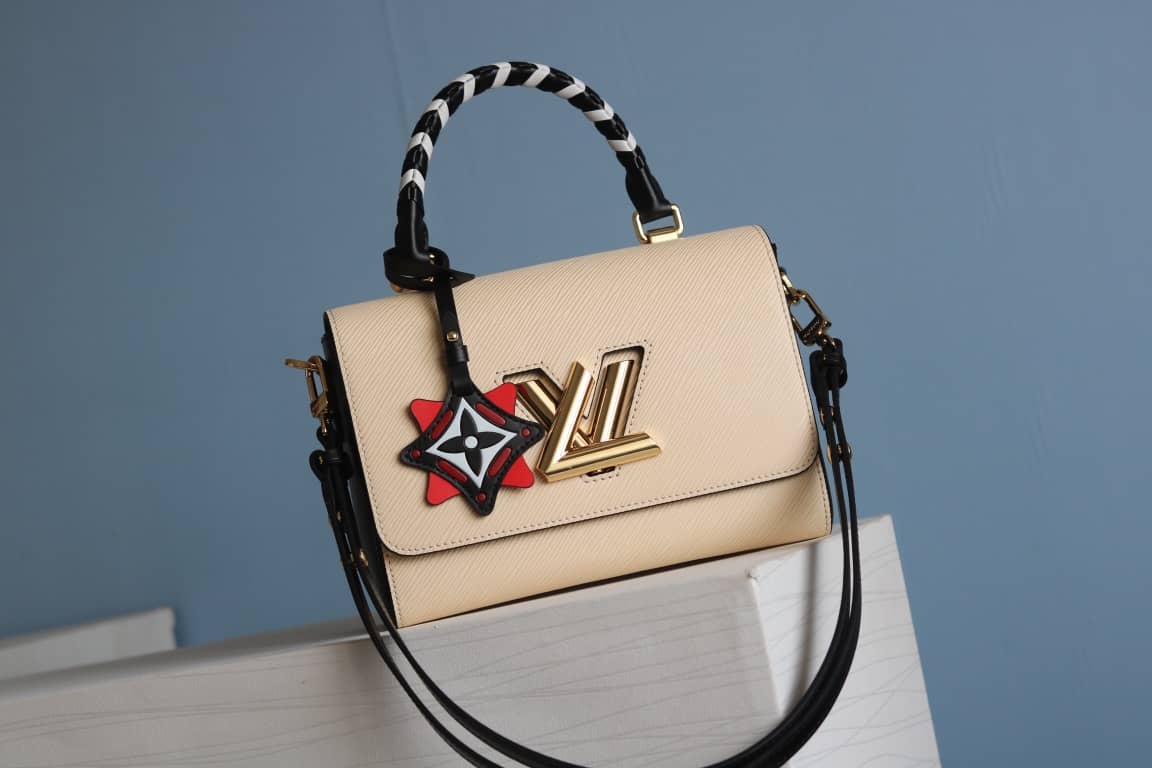 Louis Vuitton Textured Epi Leather Twist Series Bag Beige - DEEPREPS