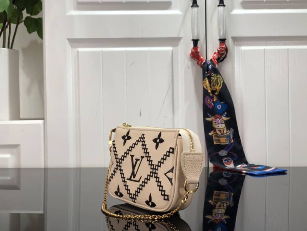 Louis Vuitton Mini Pochette Accessoires Empreinte Broderies Beige M81140 Replica - DEEPREPS