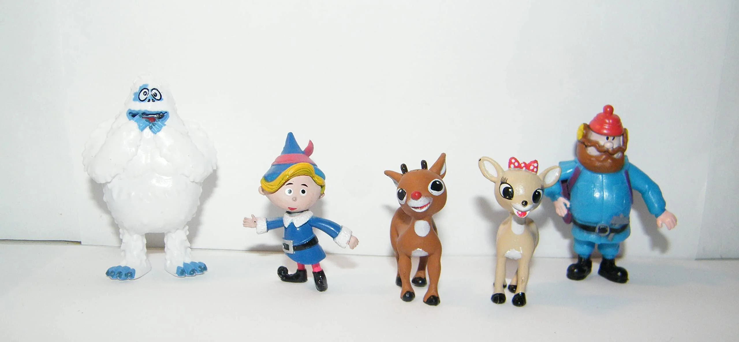 happitoys rudolph the red nosed reindeer deluxe figure toy set of 10 featuring rudolph, santa, hermey the misfit elf, bumble