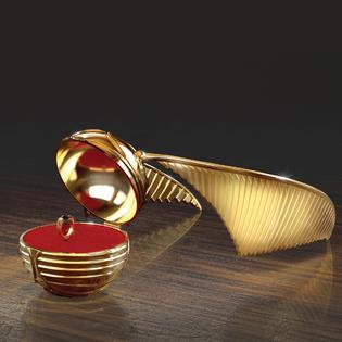 The Bradford Exchange Harry Potter Golden Snitch Cast-Metal Music Box Featuring A Recreation of Marvolo Gaunt&s;s Ring Inside