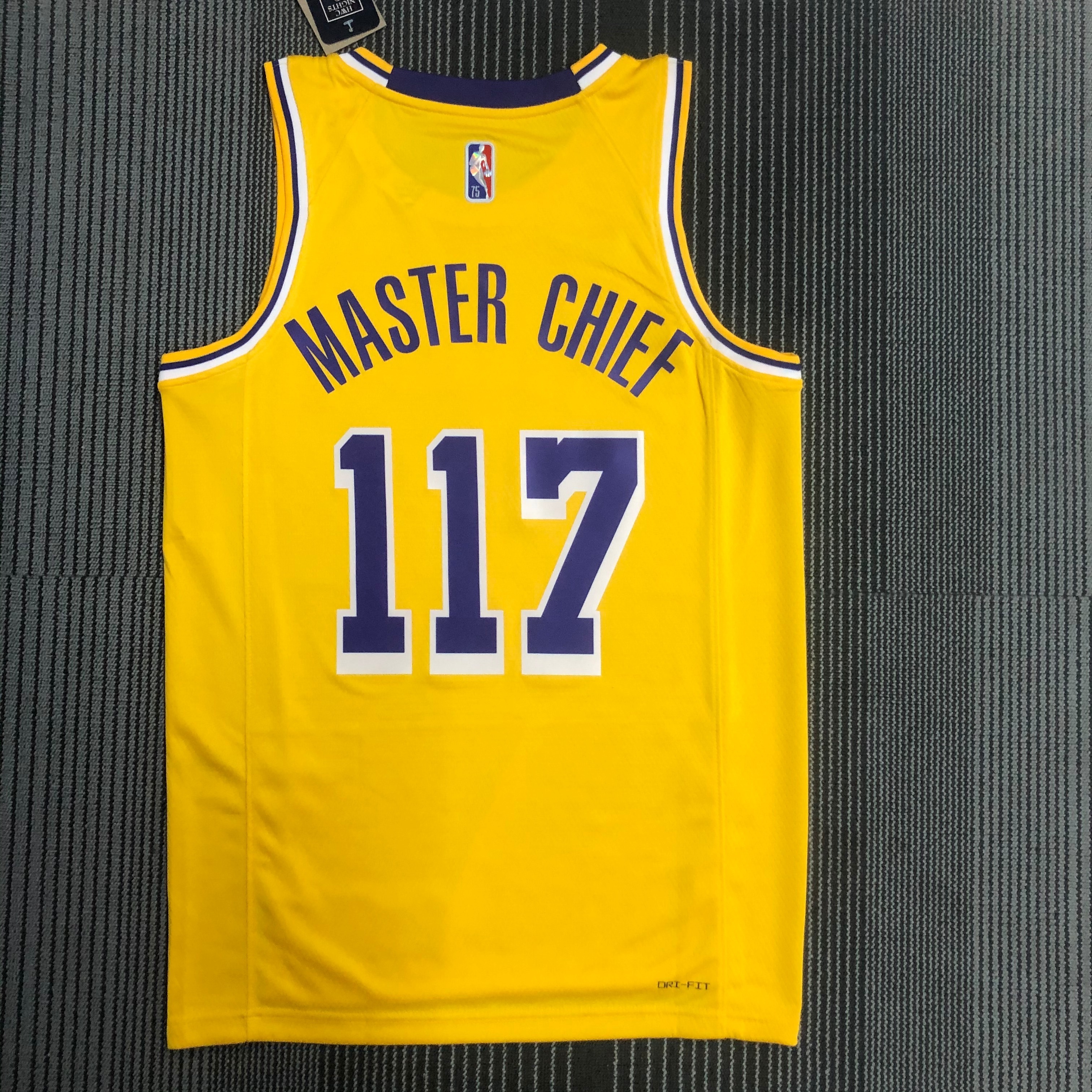 75th anniversary Lakers yellow X-BOX number 117