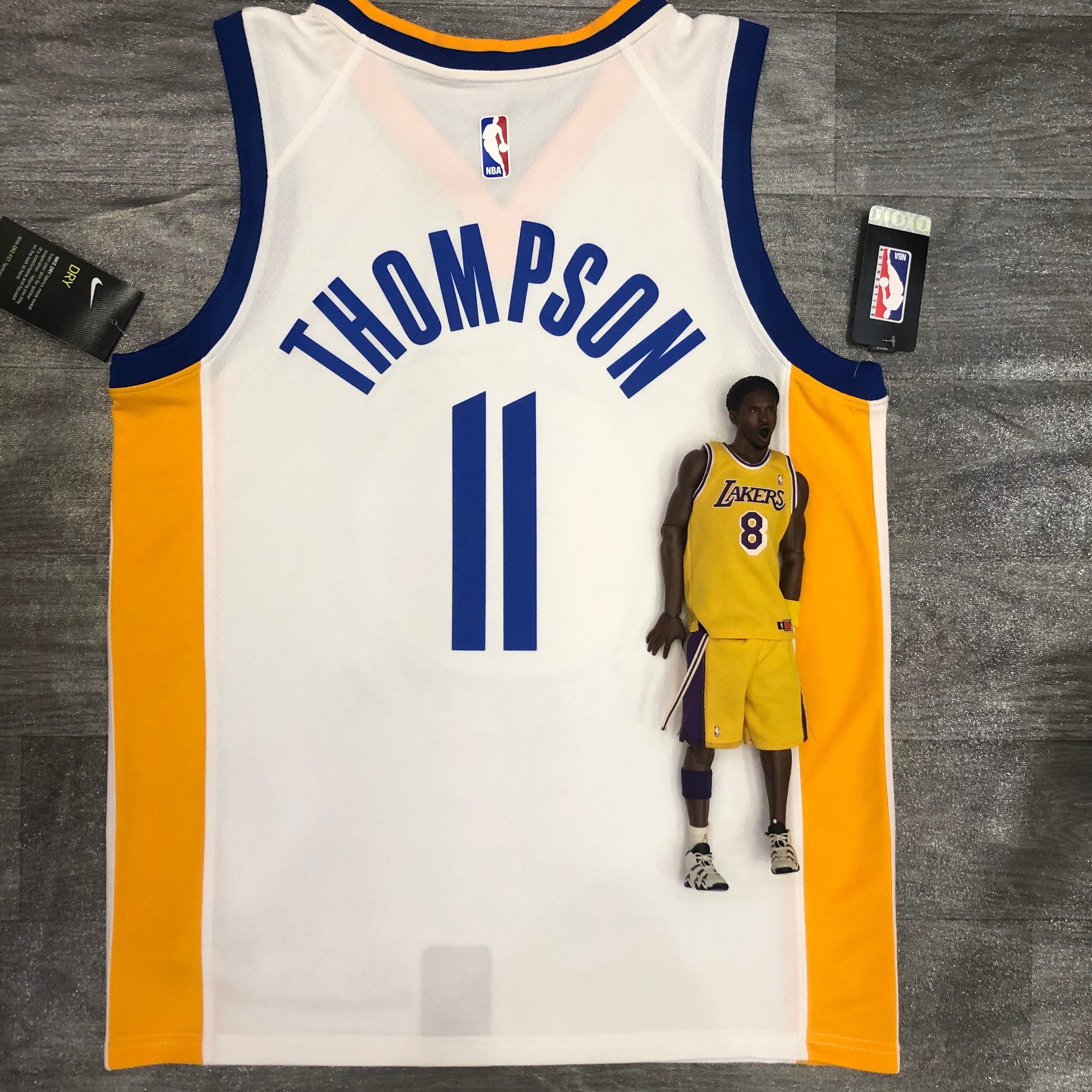 20 Warriors V-neck white number 11 Thompson