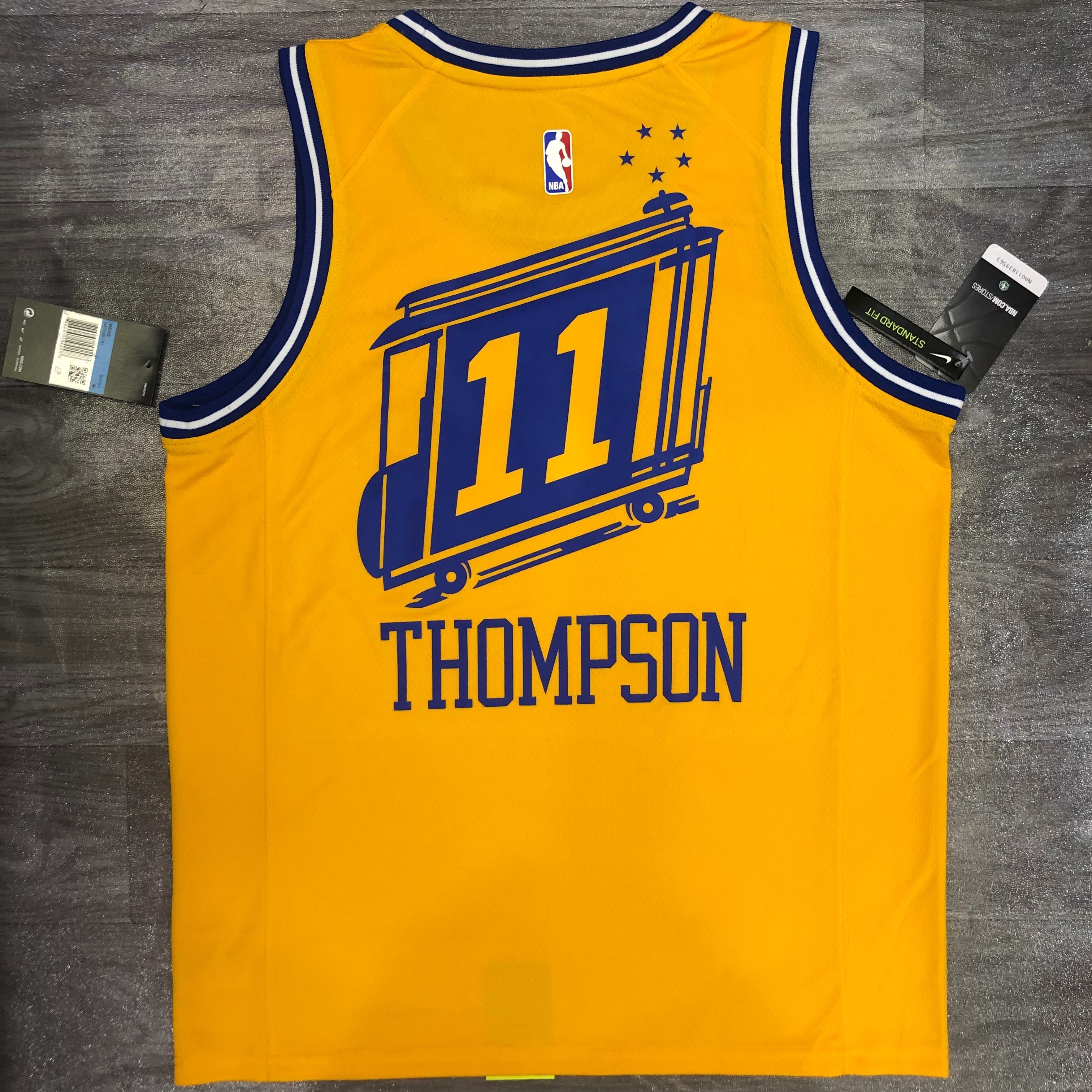 Warriors tram yellow number 11 Thompson