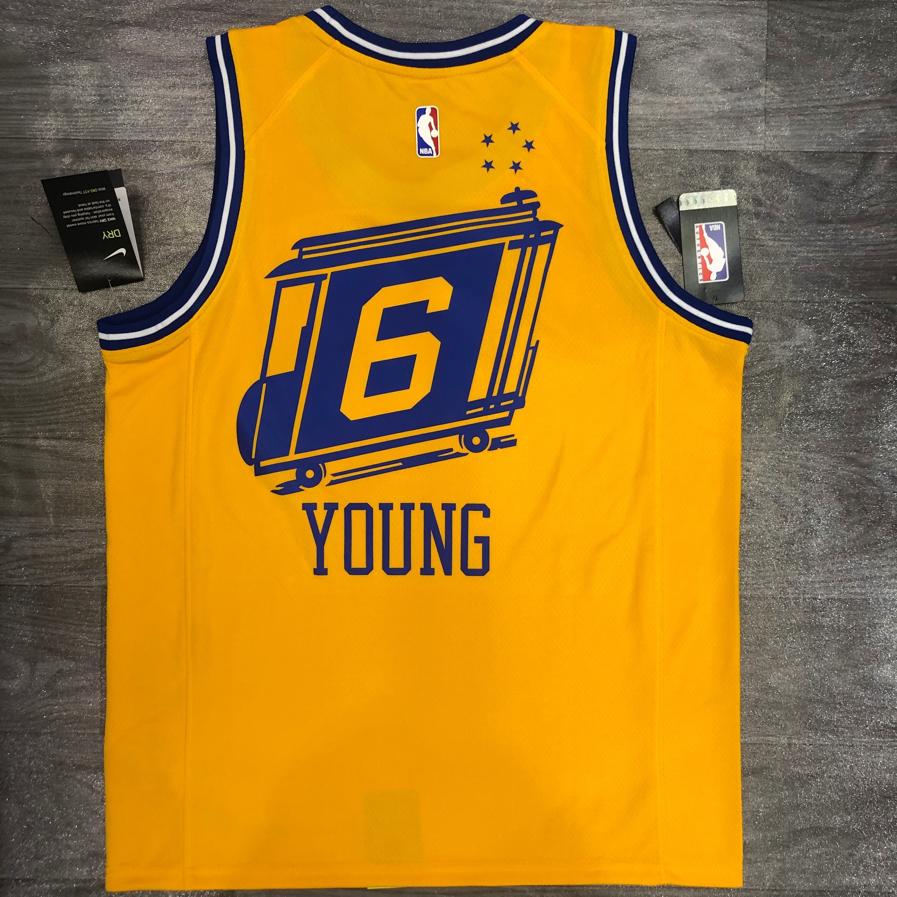Warriors streetcar version yellow number six Nick Young