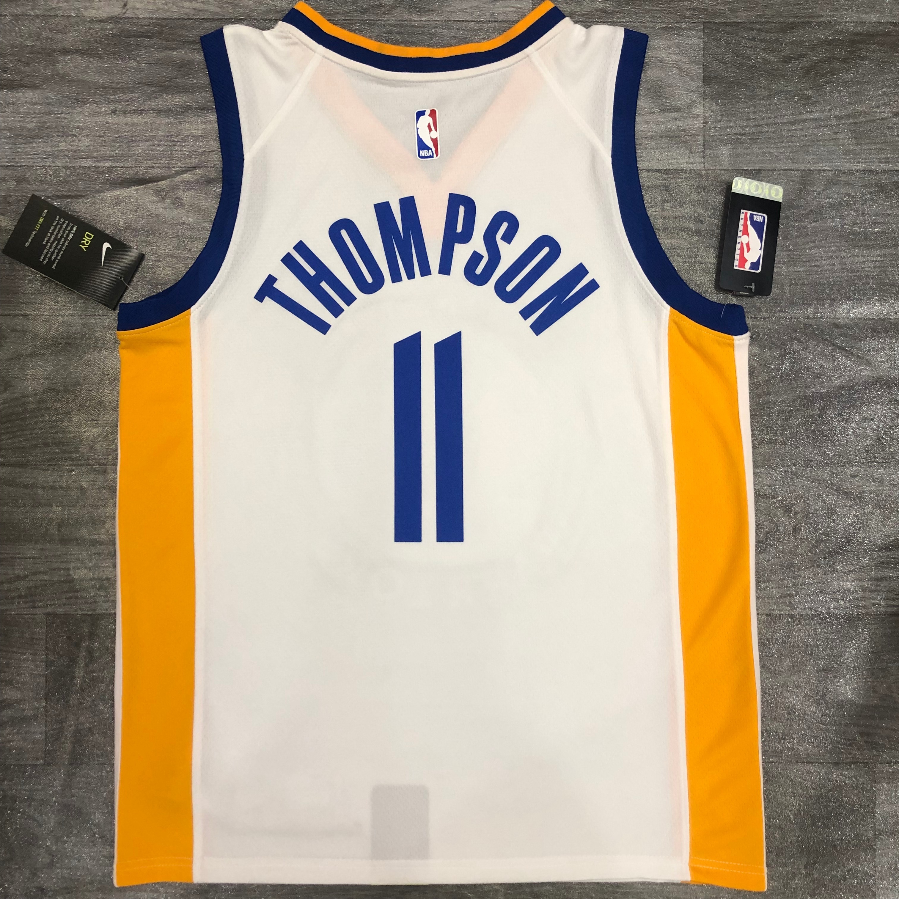 20 Warriors V-neck white number 11 Thompson