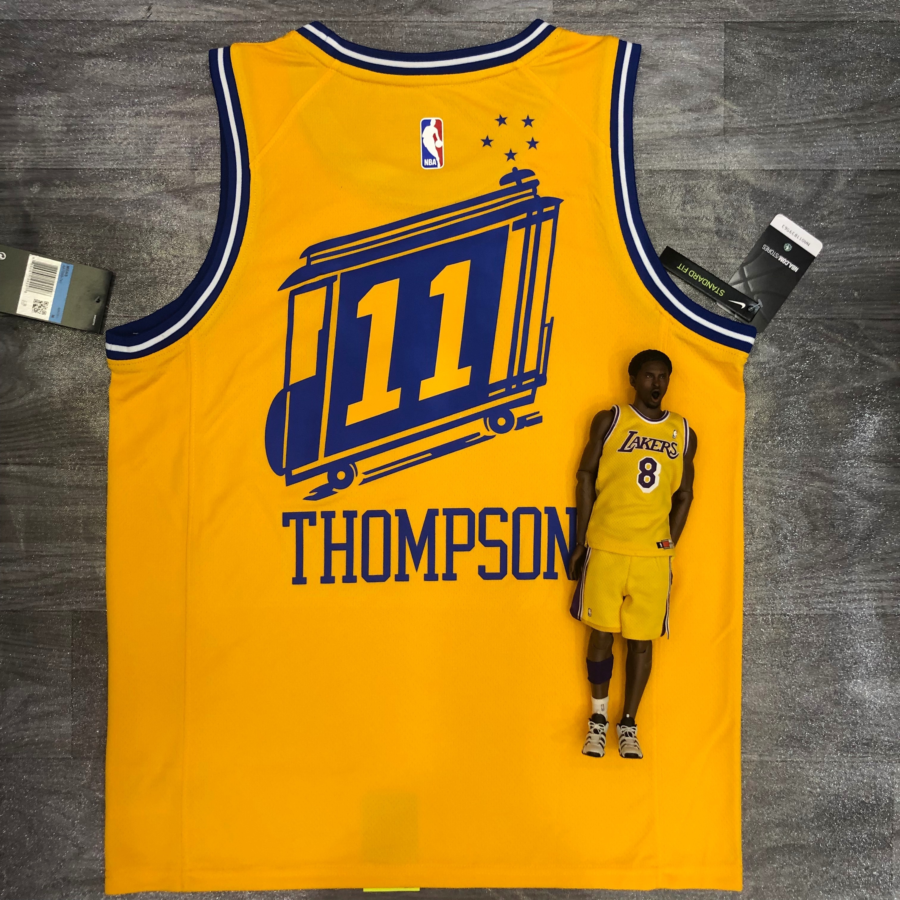 Warriors tram yellow number 11 Thompson