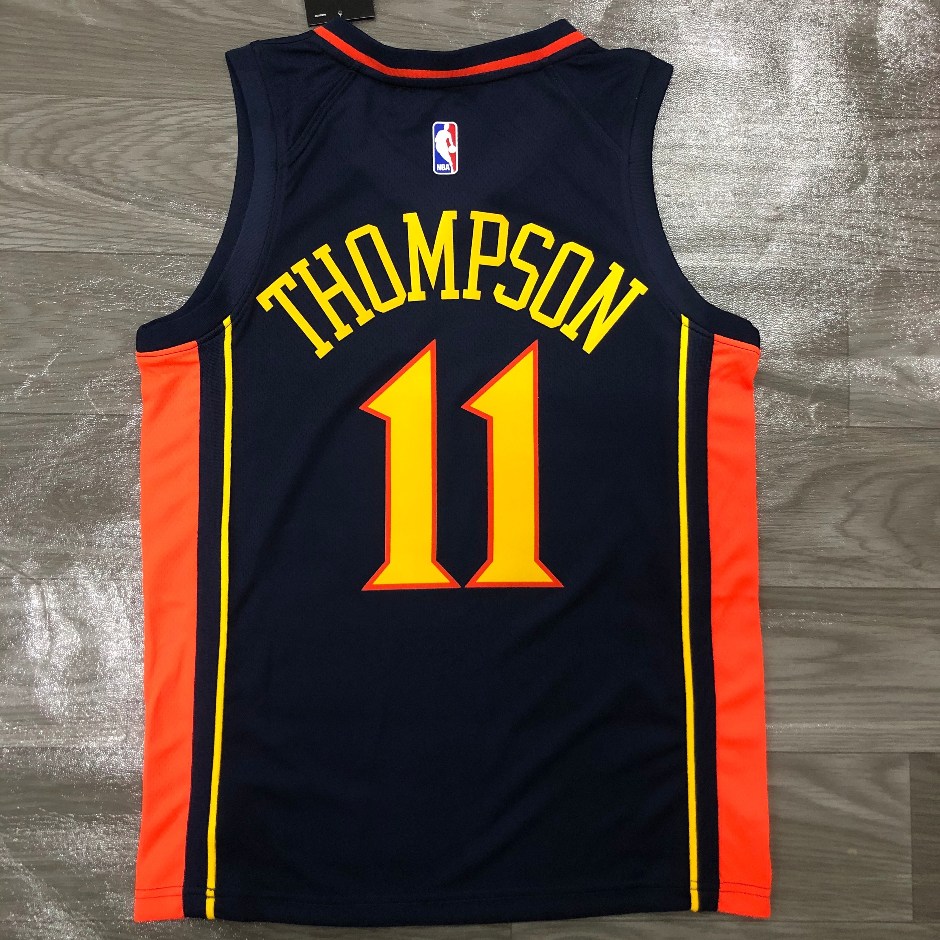 Warriors rookie navy blue number 11 Thompson