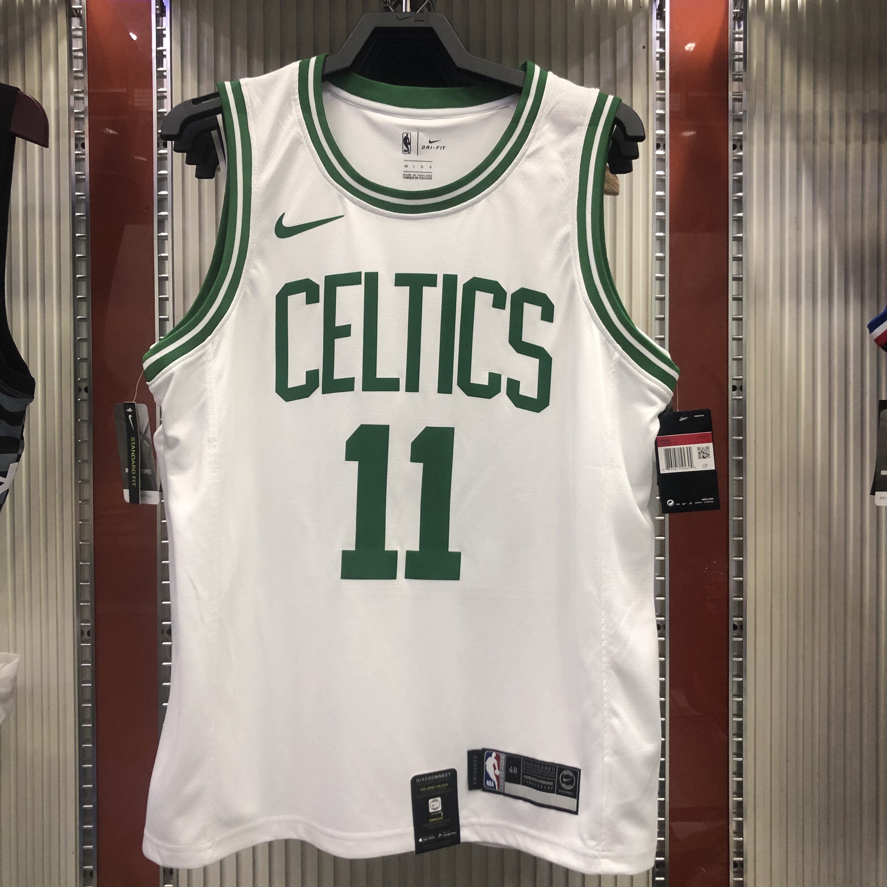 Celtics white number 11 Kyrie Irving