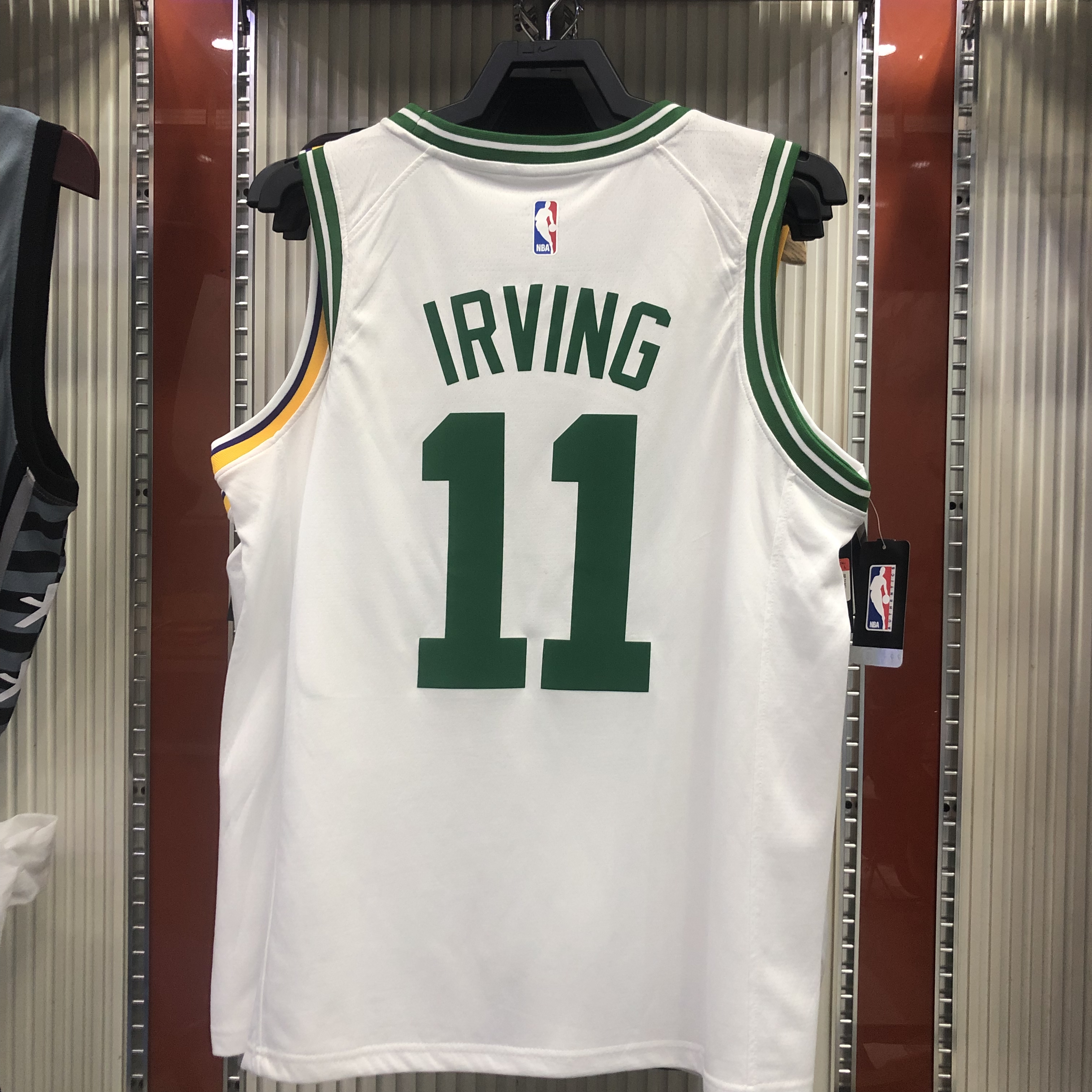 Celtics white number 11 Kyrie Irving