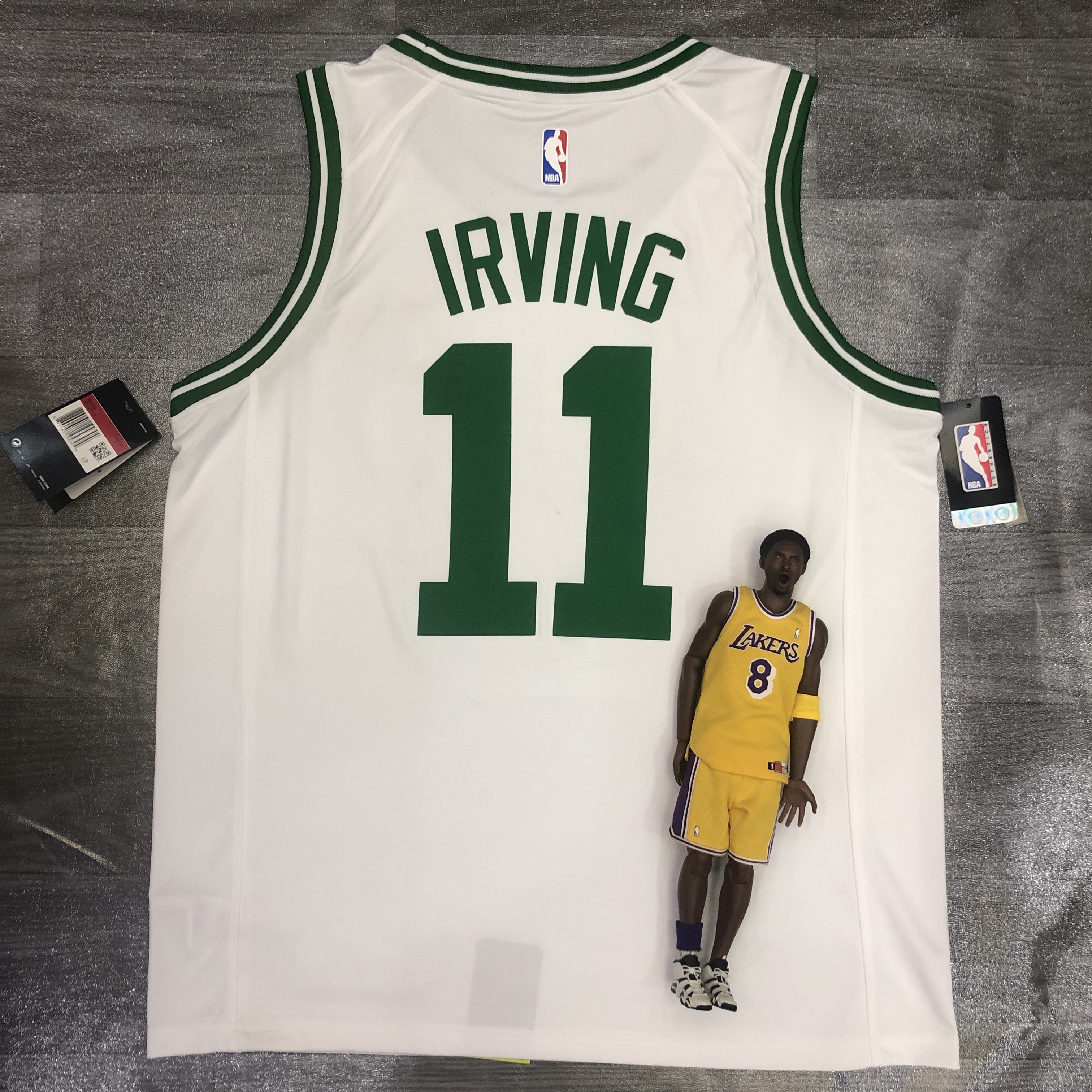 Celtics white number 11 Kyrie Irving