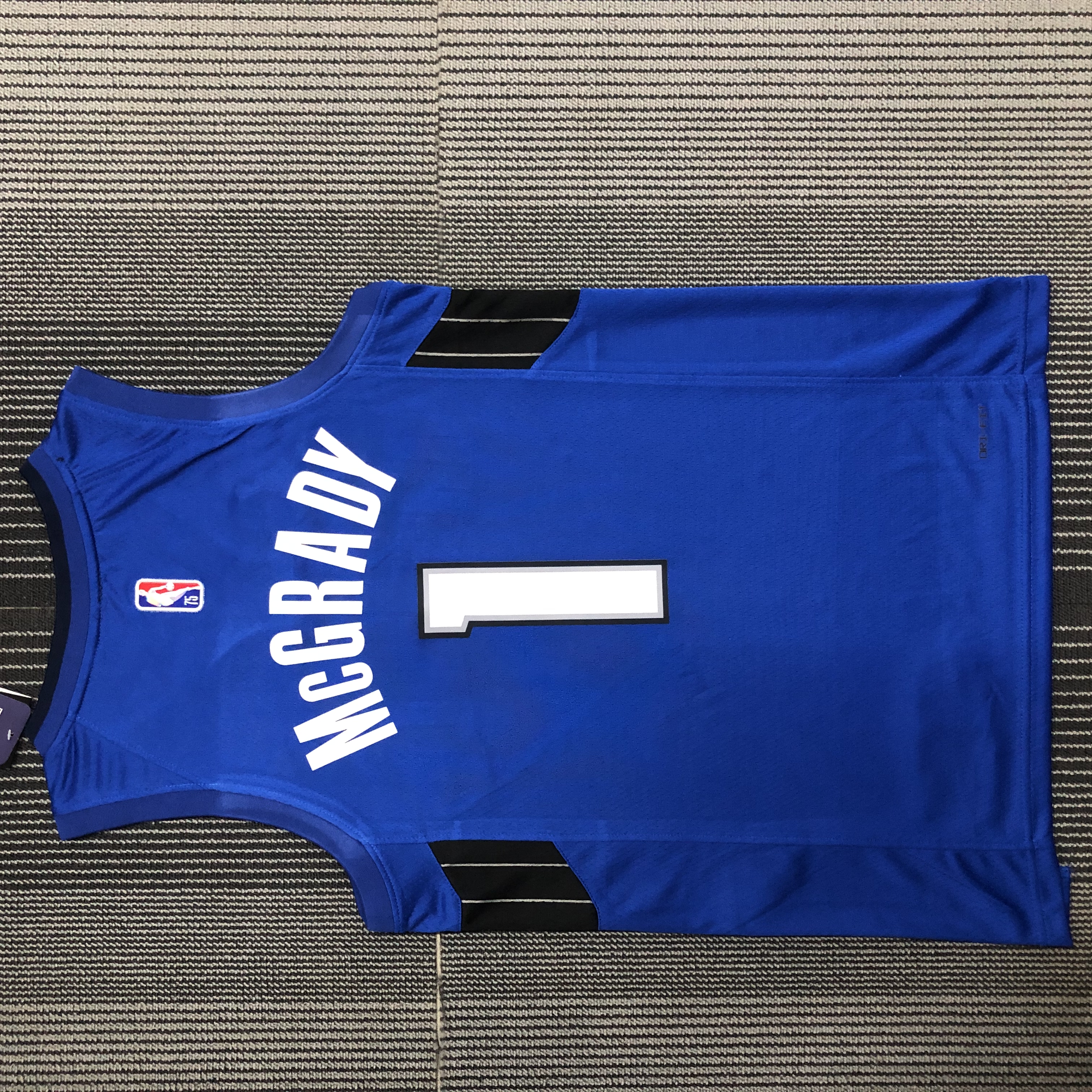 75th anniversary Magic Flying Man # 1 Tracy McGrady