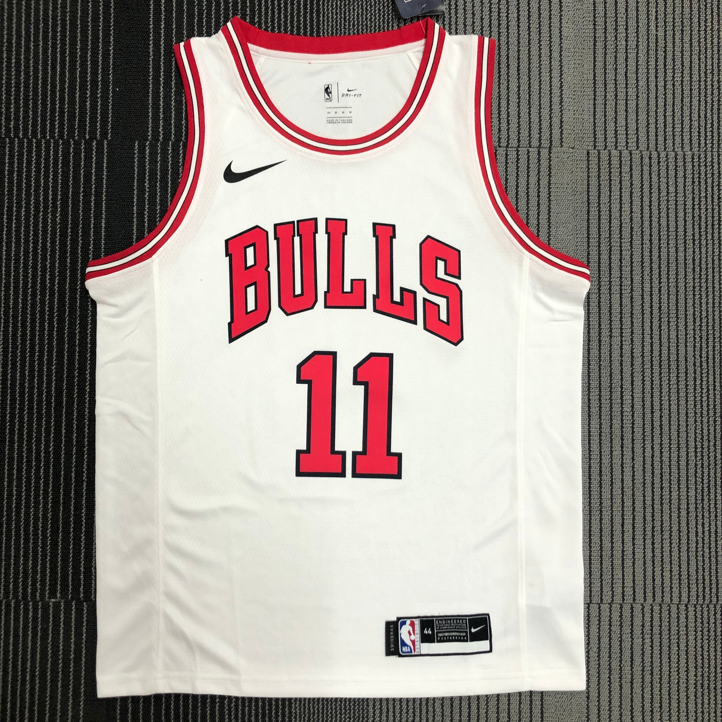 Bulls white number 11 Demar derozan