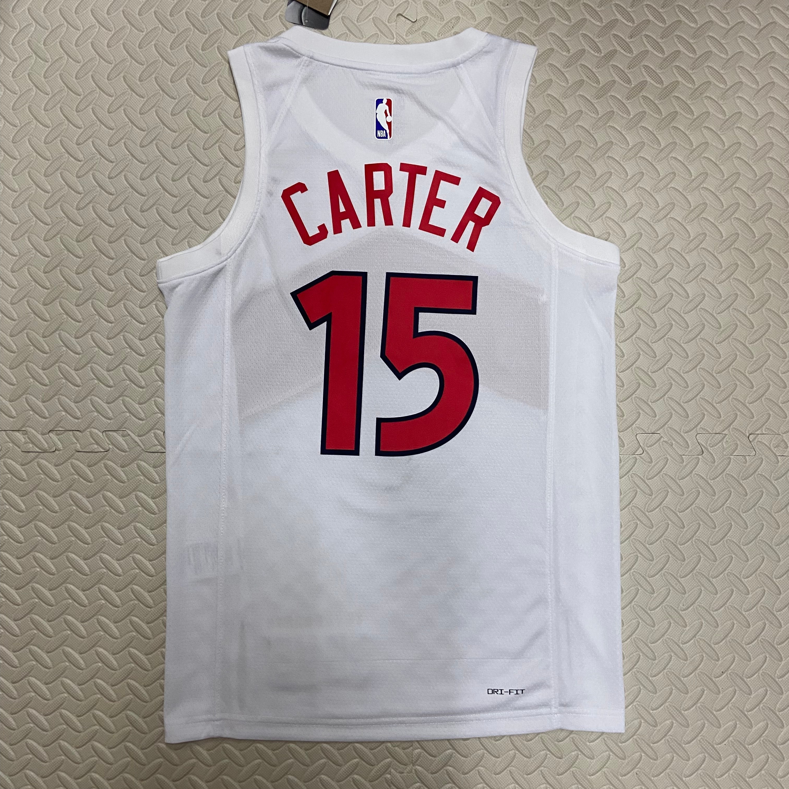 23 season, the Raptors home number 15 Carter