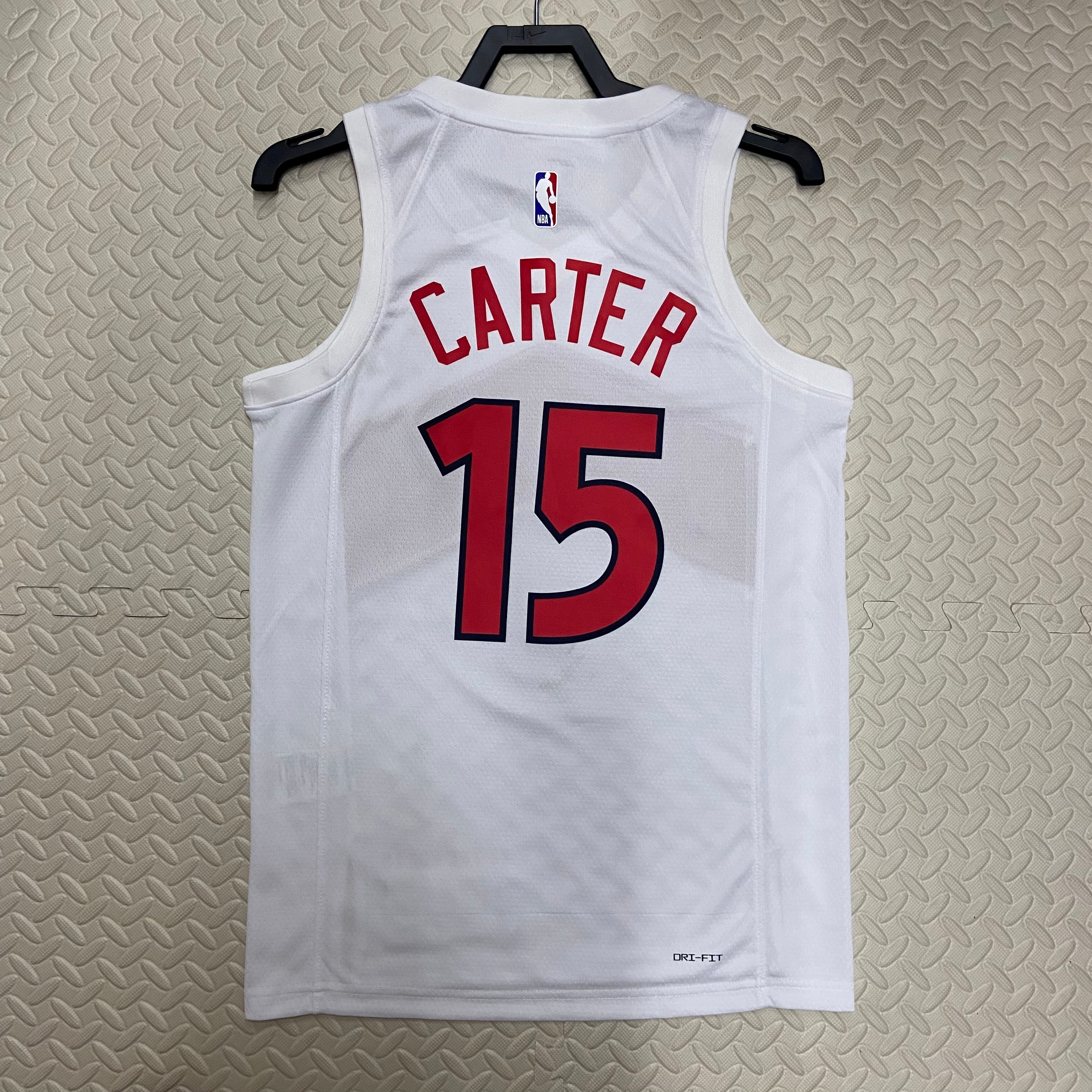 23 season, the Raptors home number 15 Carter