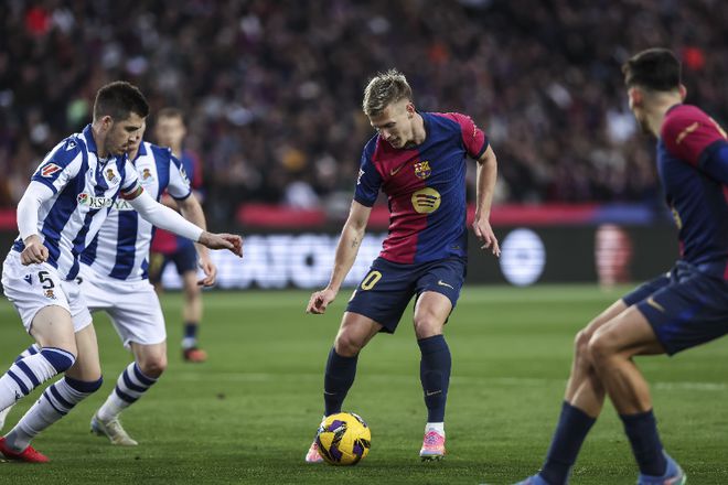 Barcelona returned to the top of La Liga with a 4-0 thrashing of Real Sociedad  [jiayu] 