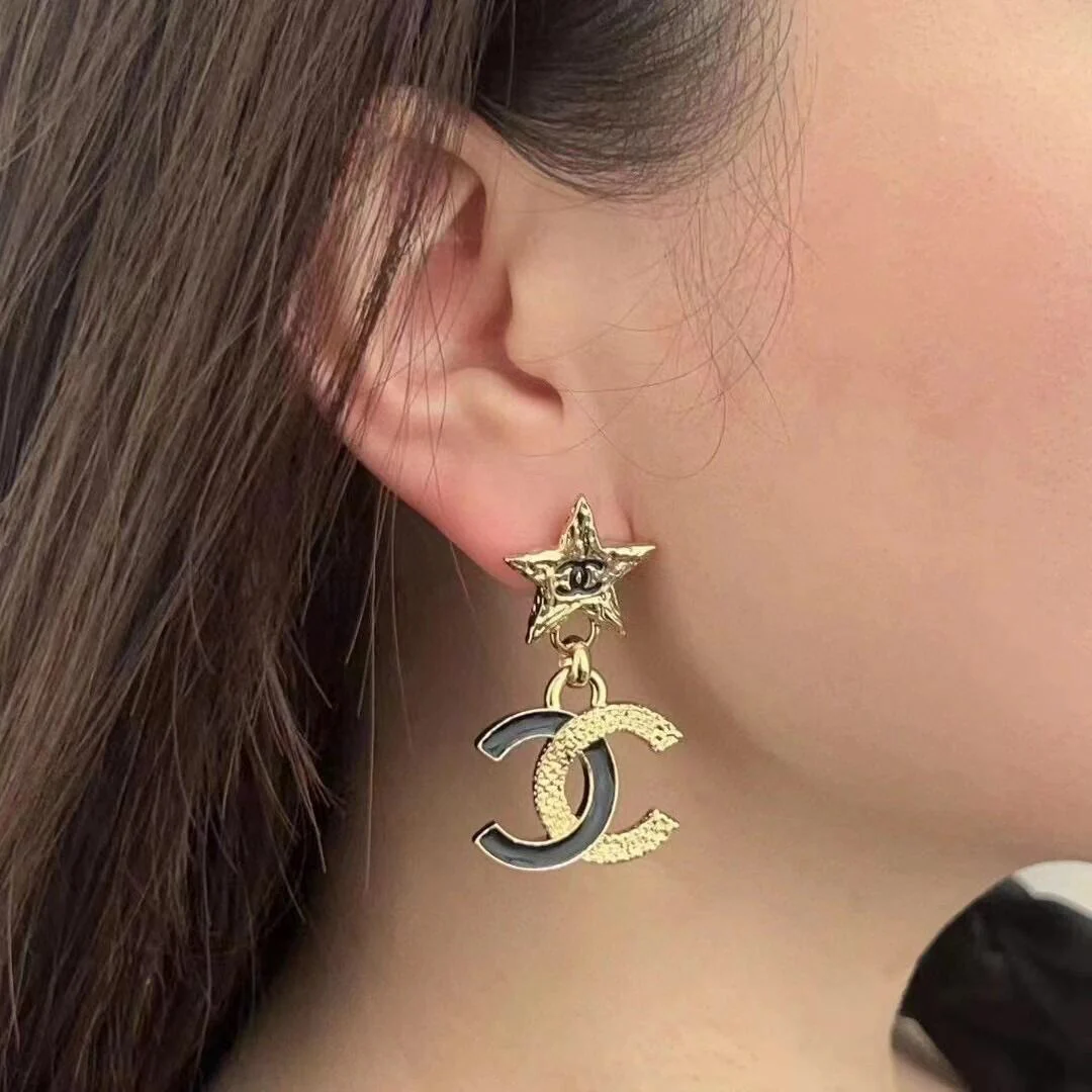 CCE290 Chanel 24p metal gold embossment and black enamel asymmetry CC logo stud Earring - ccjewelryacc