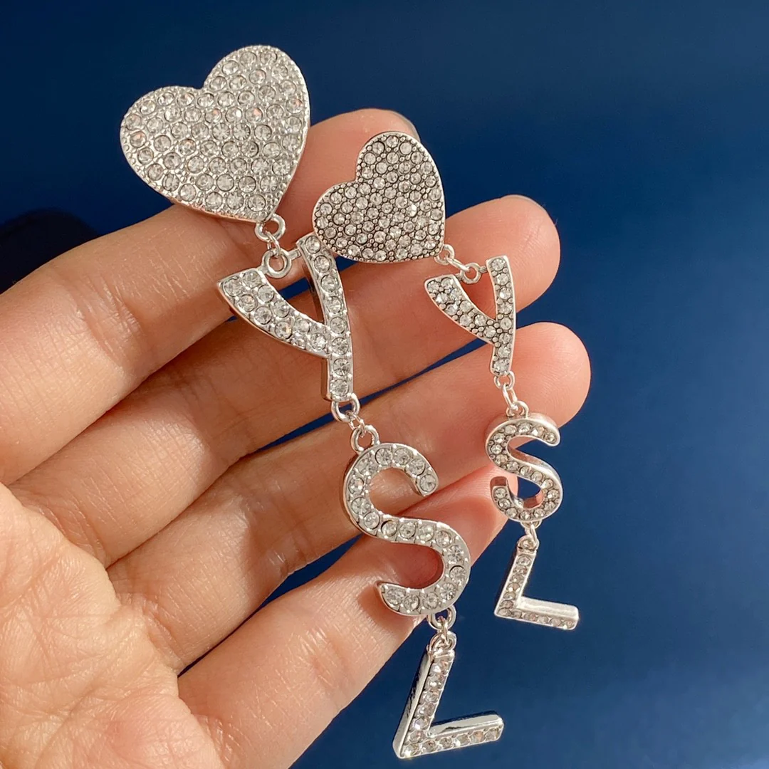 YYE004 YVES Opyum heart earrings clip in metal and crystal - ccjewelryacc