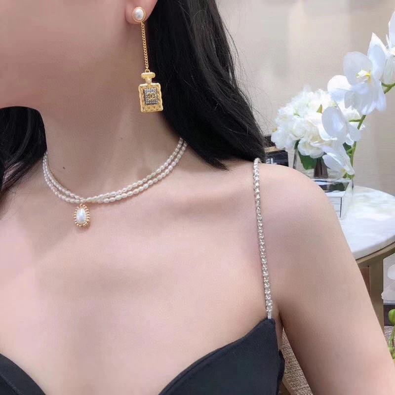 CCE441 Gold crystal perfume bottle drop earring - ccjewelryacc