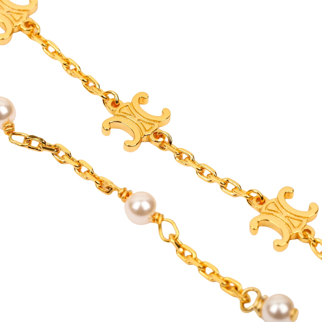 CLE007  Triomphe long pearl drop earrings in metal and pearl - ccjewelryacc