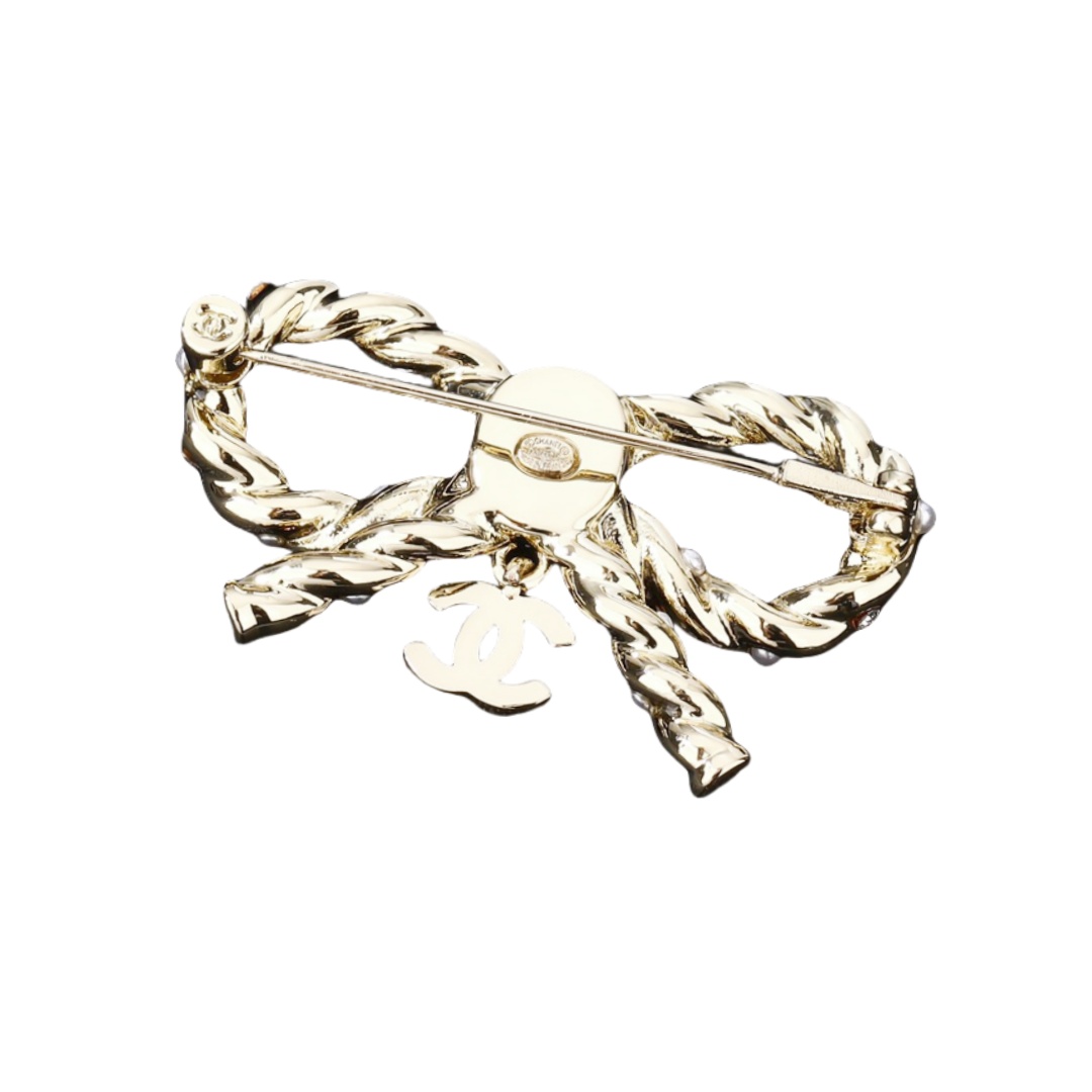 BCB373 Crystal twist bow with cc logo brooch - ccjewelryacc