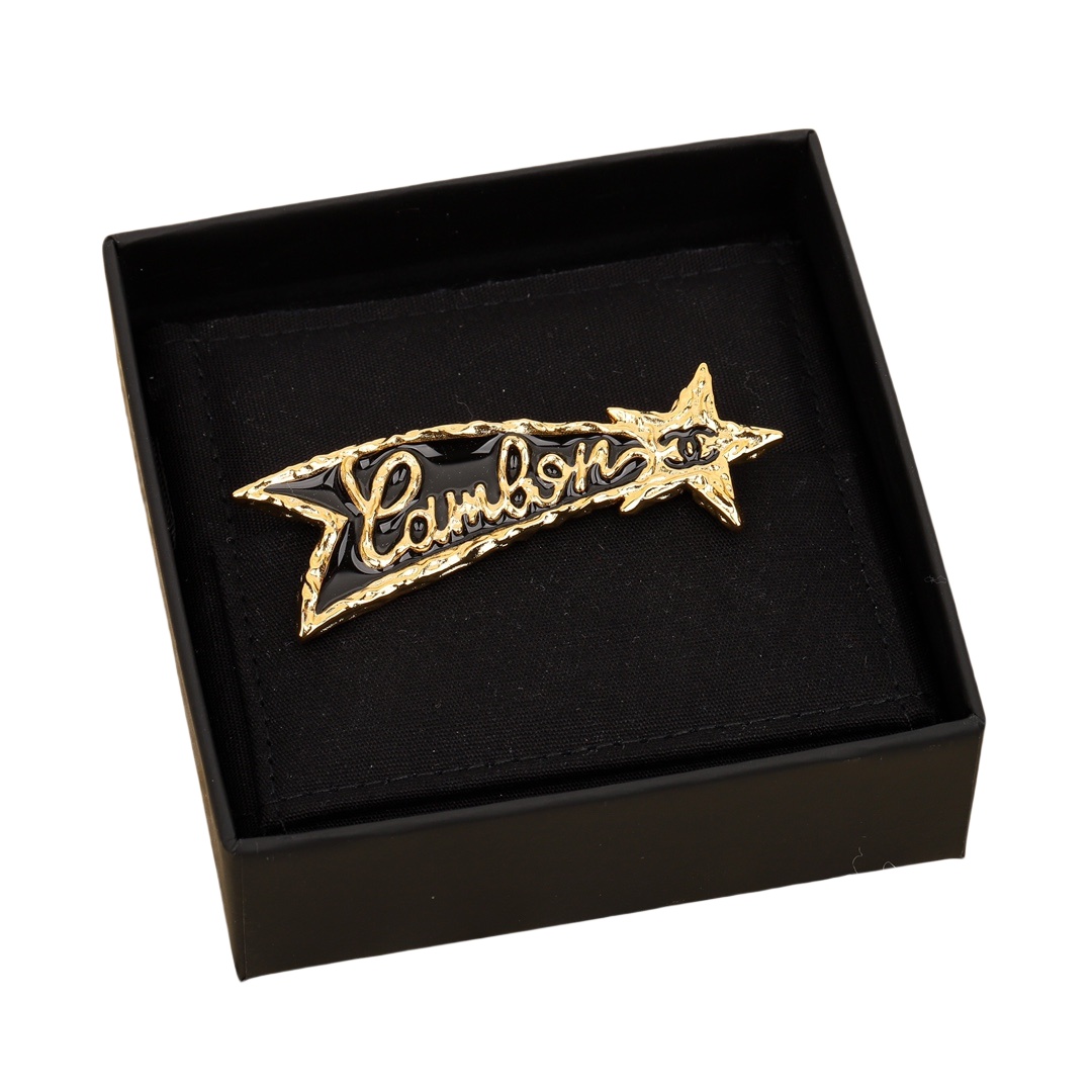 BCB298 24p Embossment and black enamel shooting star with cc logo brooch pin - ccfashionjewelry