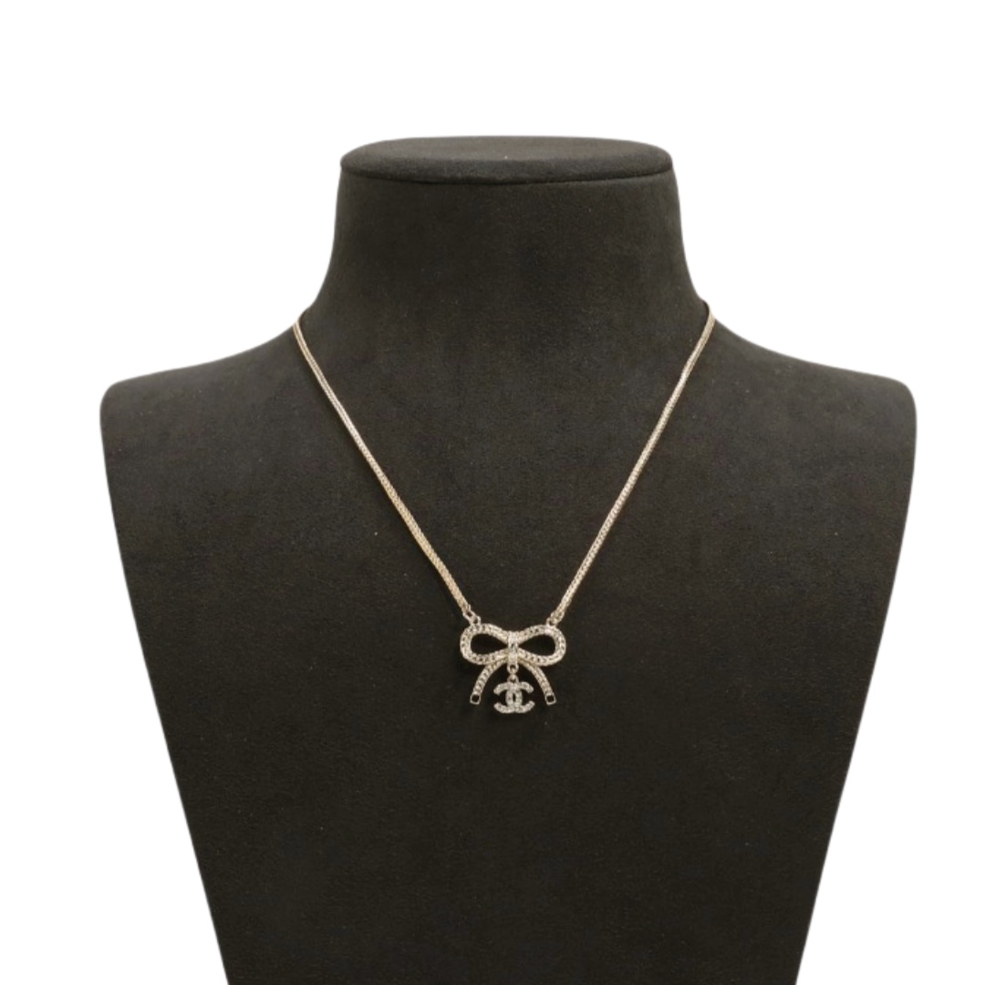 CCN567 Mute gold hollow bow double C rhinestone pendant necklace - ccfashionjewelry