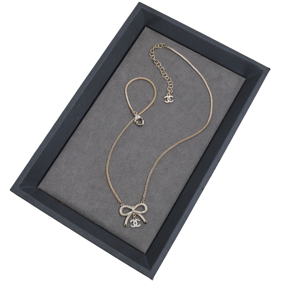 CCN567 Mute gold hollow bow double C rhinestone pendant necklace - ccjewelryacc