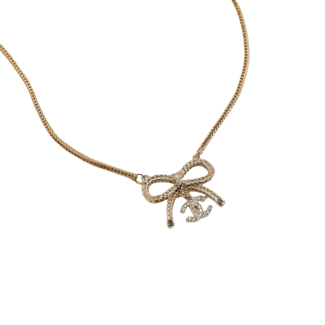 CCN567 Mute gold hollow bow double C rhinestone pendant necklace - ccfashionjewelry