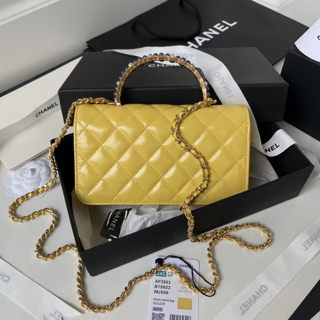 Chanel 24P AP3803 Shiny Crinkled Lambskin Chain Clutch Pearl Handle Yellow