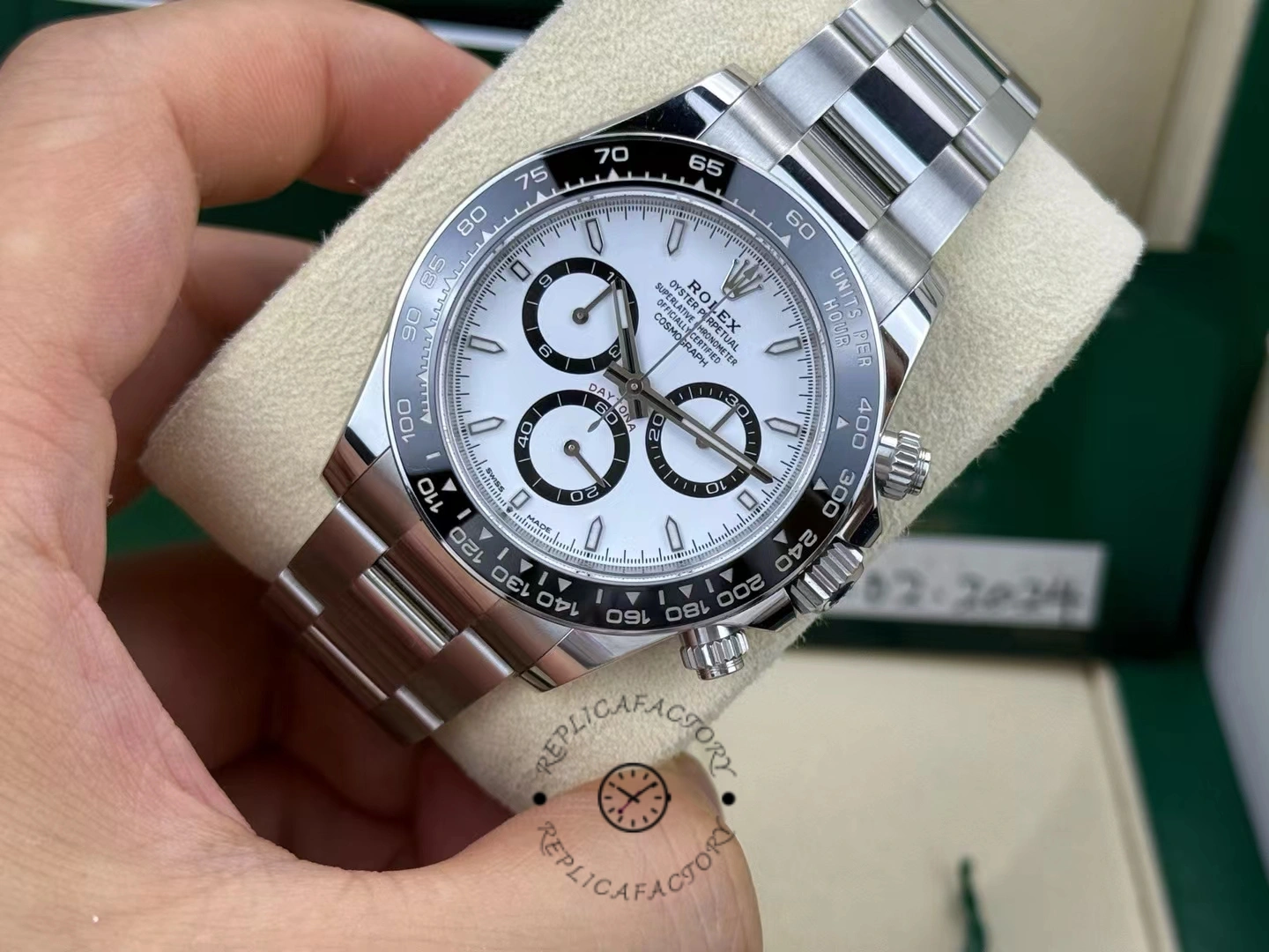 Close-up front view of the Rolex Cosmograph Daytona 116500LN showing details of the ceramic dial, subdials and bezel in use