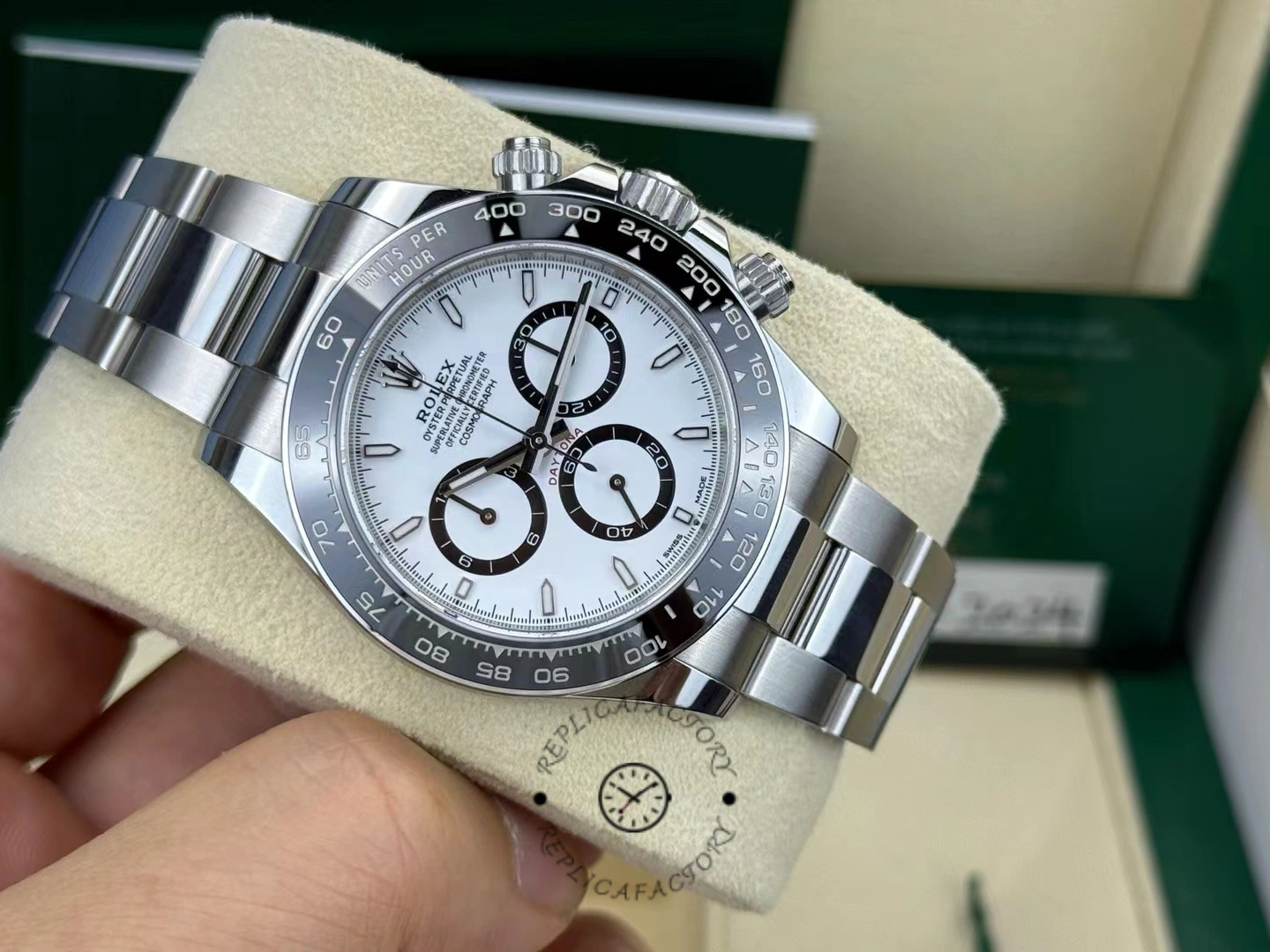 Angled front view of the Rolex Cosmograph Daytona 116500LN showing the white dial and black ceramic bezel under natural light