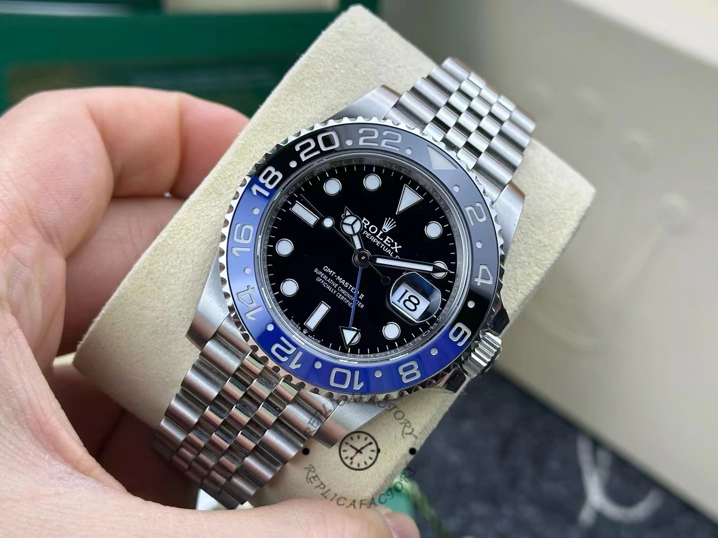Angled front view of used Rolex GMT-Master II 126710BLNR-0002 showing minimal wear on case and bracelet.
