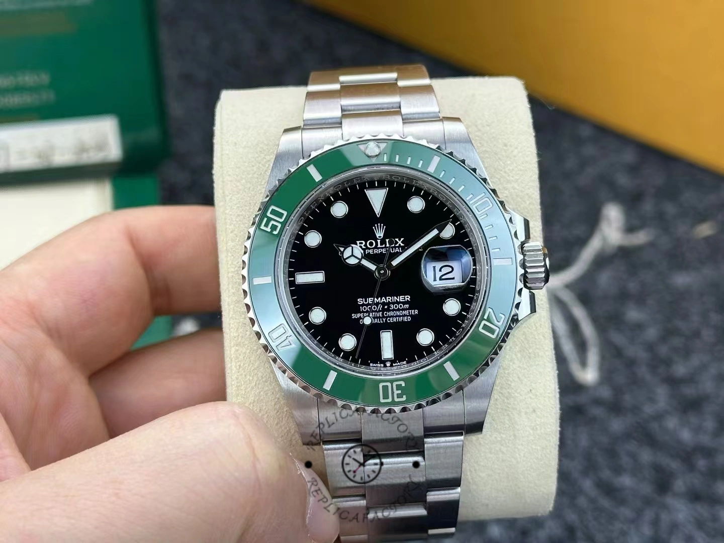 Rolex Submariner 126610LV used after 3 years, with natural wear and green bezel.