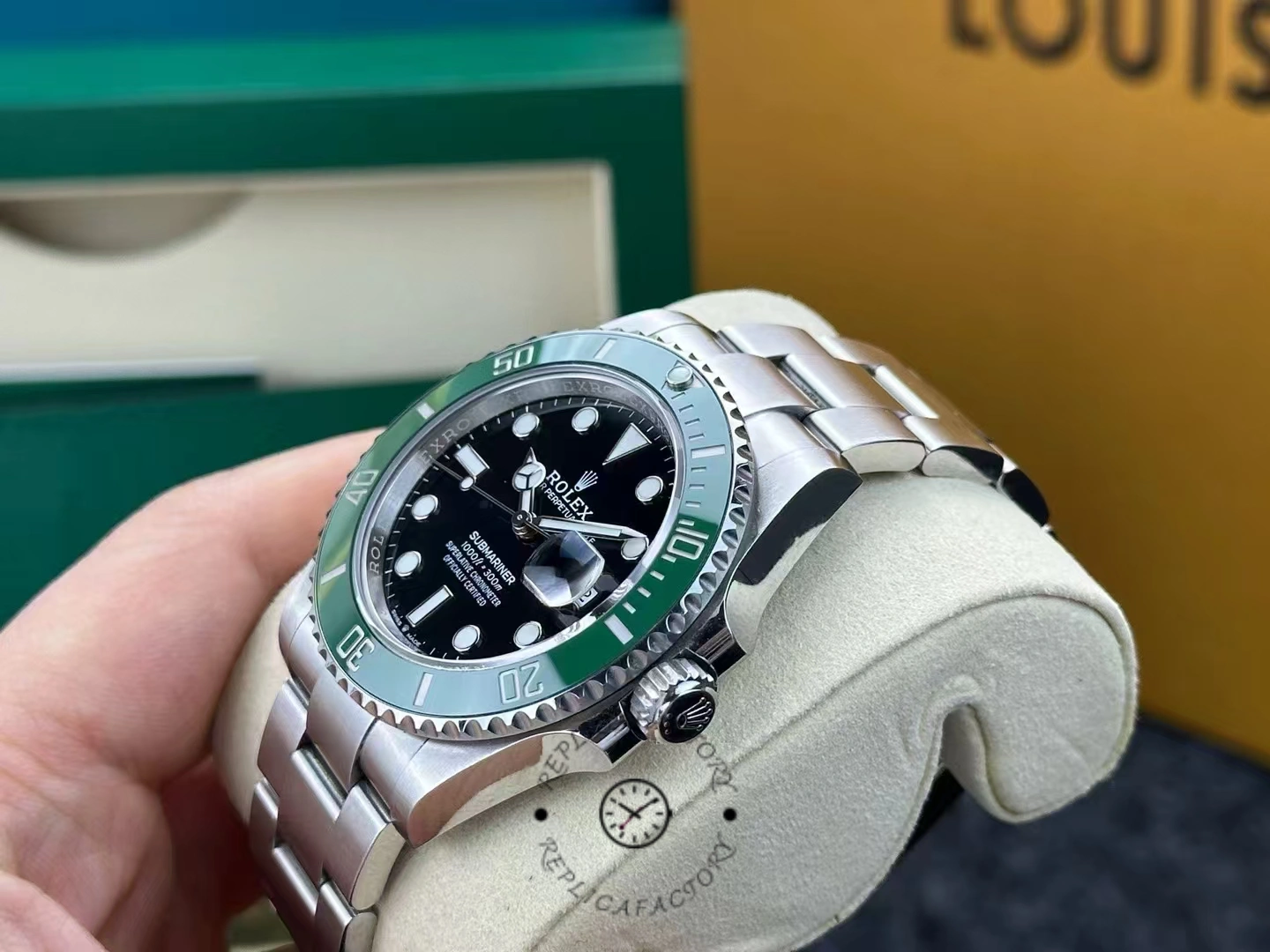Side angle of a used Rolex Submariner 126610LV showing the case and crown profile.