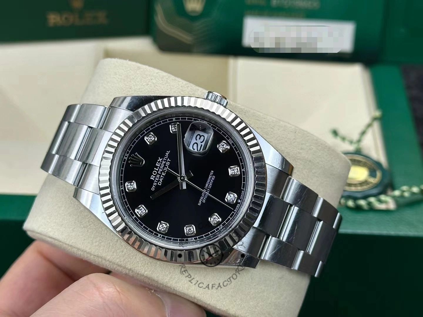 Rolex Datejust 41 with fluted bezel and black dial with diamonds m126334 0011