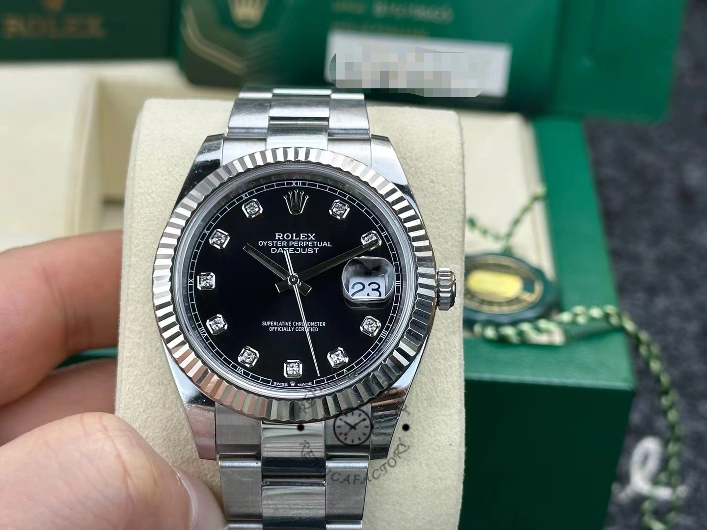 Rolex Datejust 41 with fluted bezel and black dial with diamonds