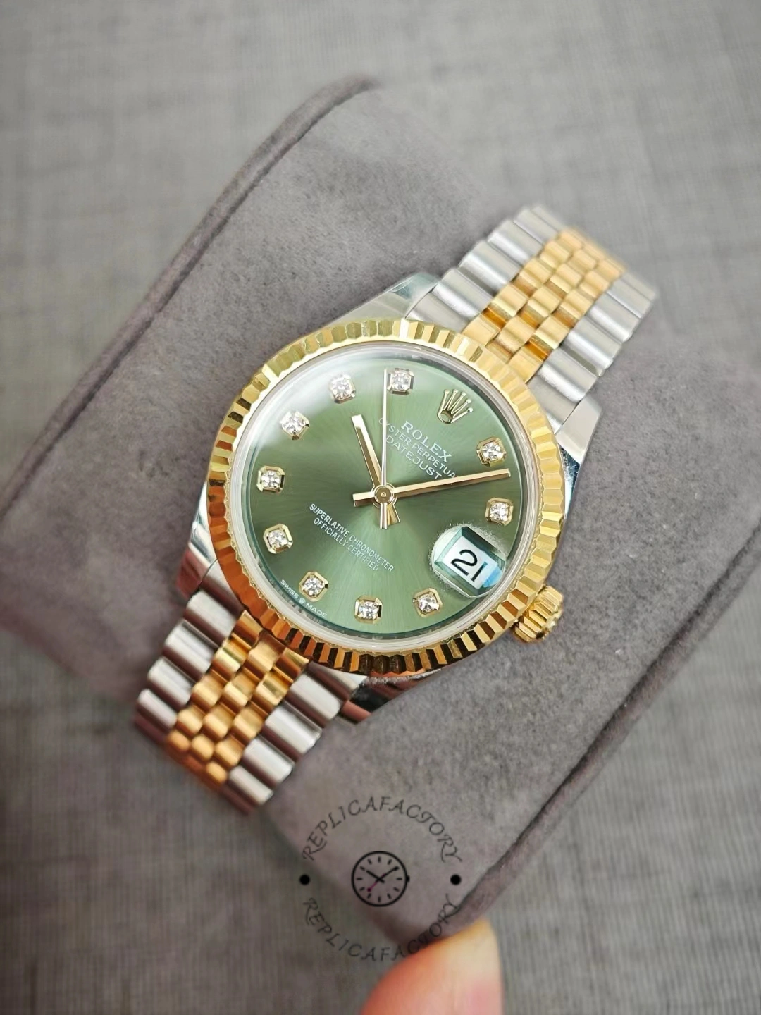 Rolex Datejust 31 two-tone with green dial and fluted bezel after 2 years of use