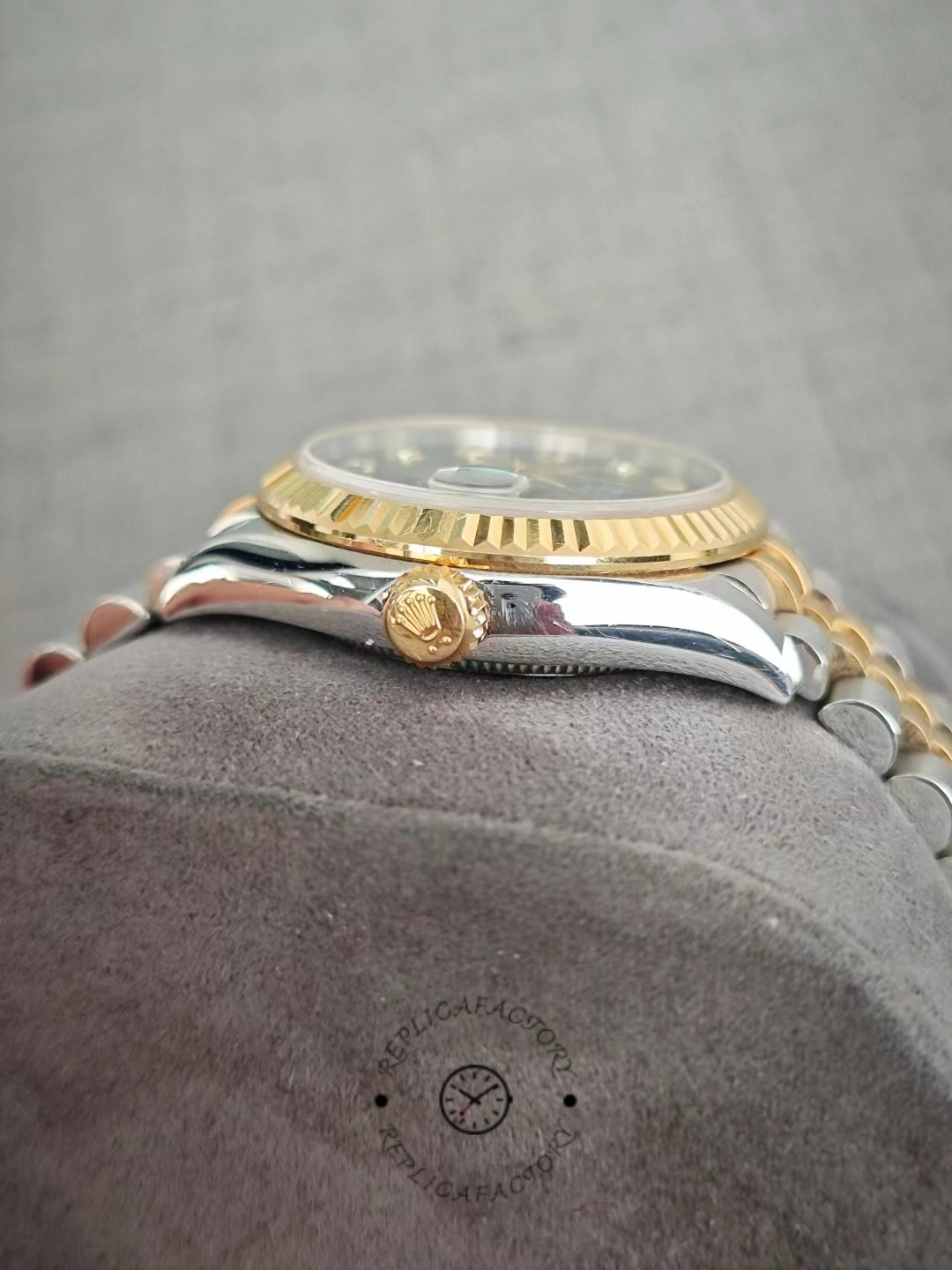 Side view of Rolex Datejust 31 278273 with gold crown and polished case after 2 years