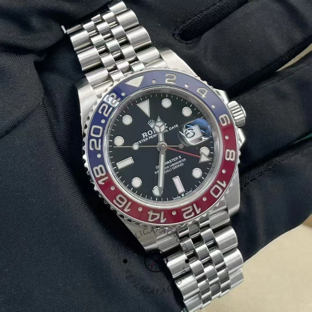 Second-hand Rolex GMT-Master II 126710BLRO with black dial and Pepsi bezel on Jubilee bracelet.