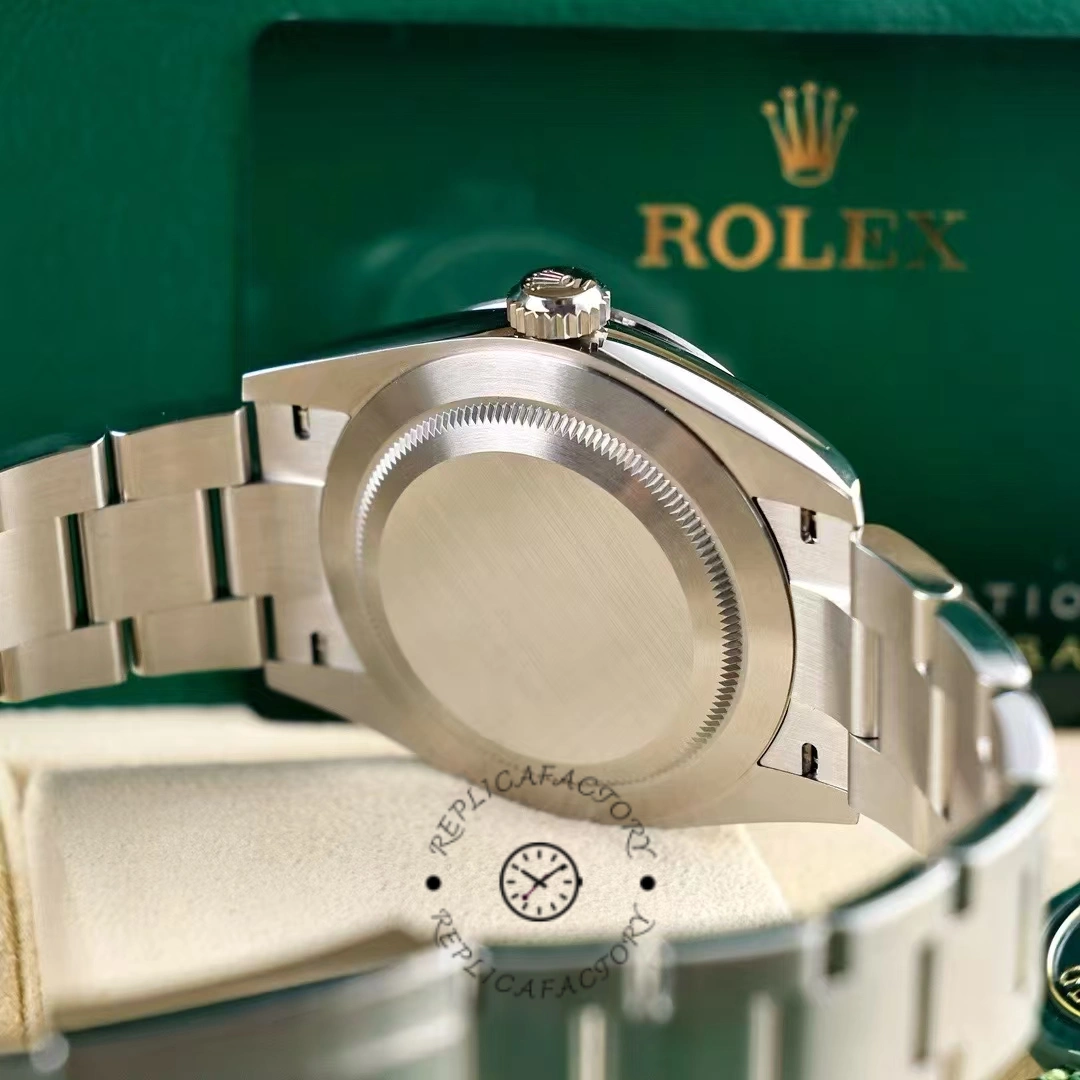 View of the caseback of the Rolex Explorer 224270 with brushed finish and green Rolex card on the back.