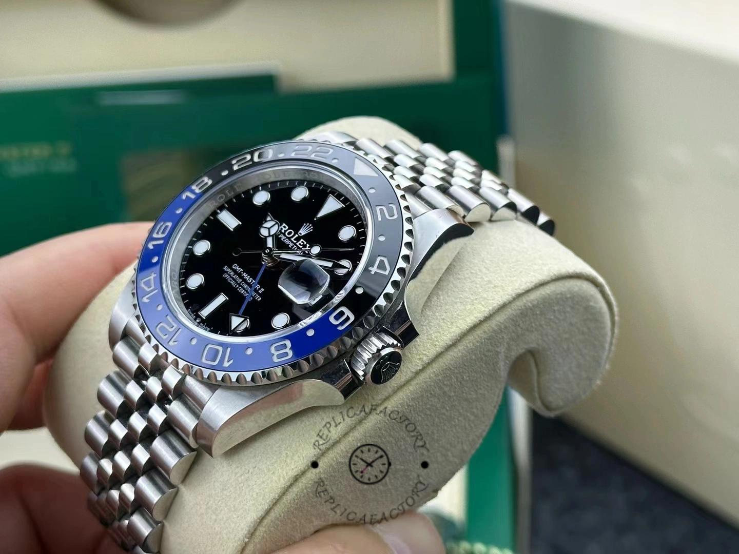 Side view of the Rolex GMT-Master II 126710BLNR-0002 after one year, highlighting the polished case and bezel reflection.